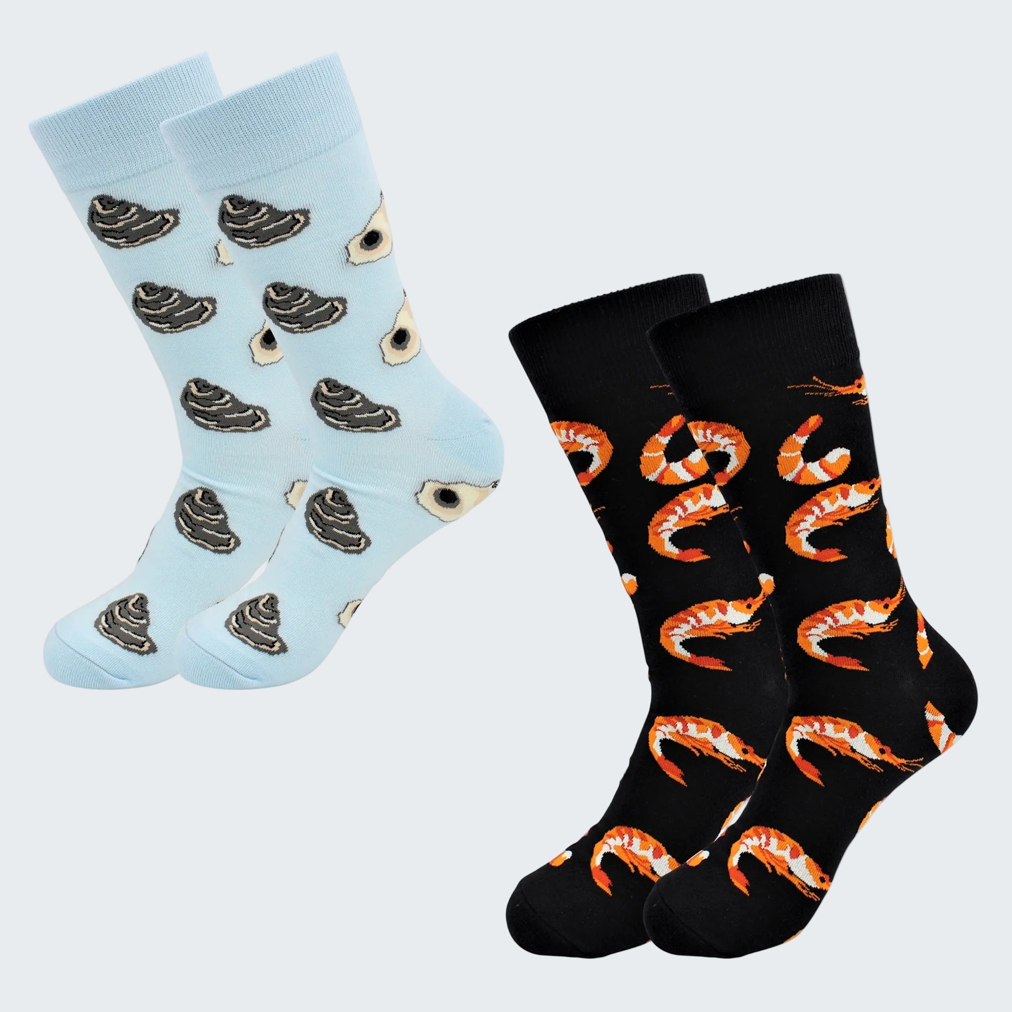 Two pairs of socks with unique patterns on a white background