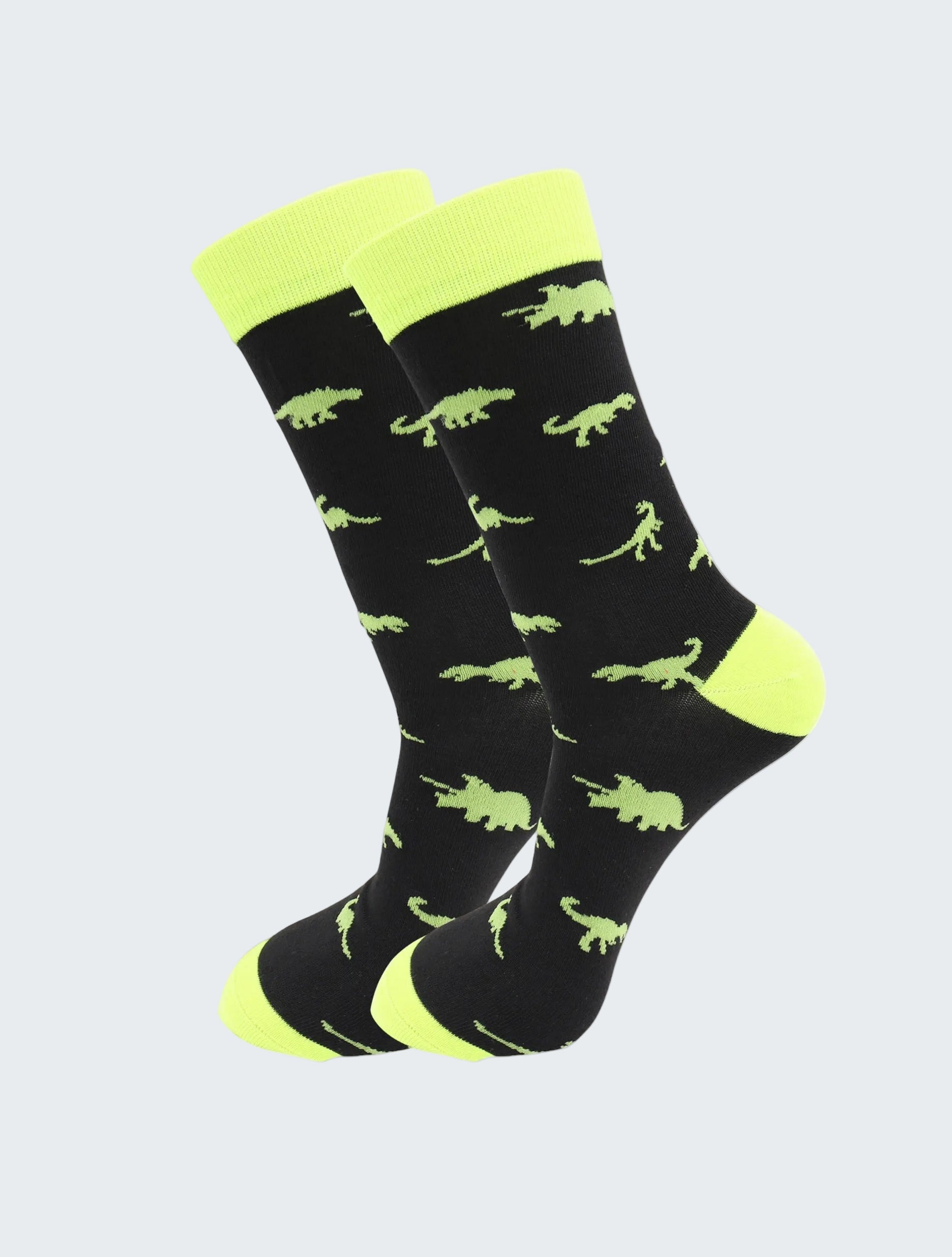 Black socks with green dinosaur pattern and neon yellow accents on a white background