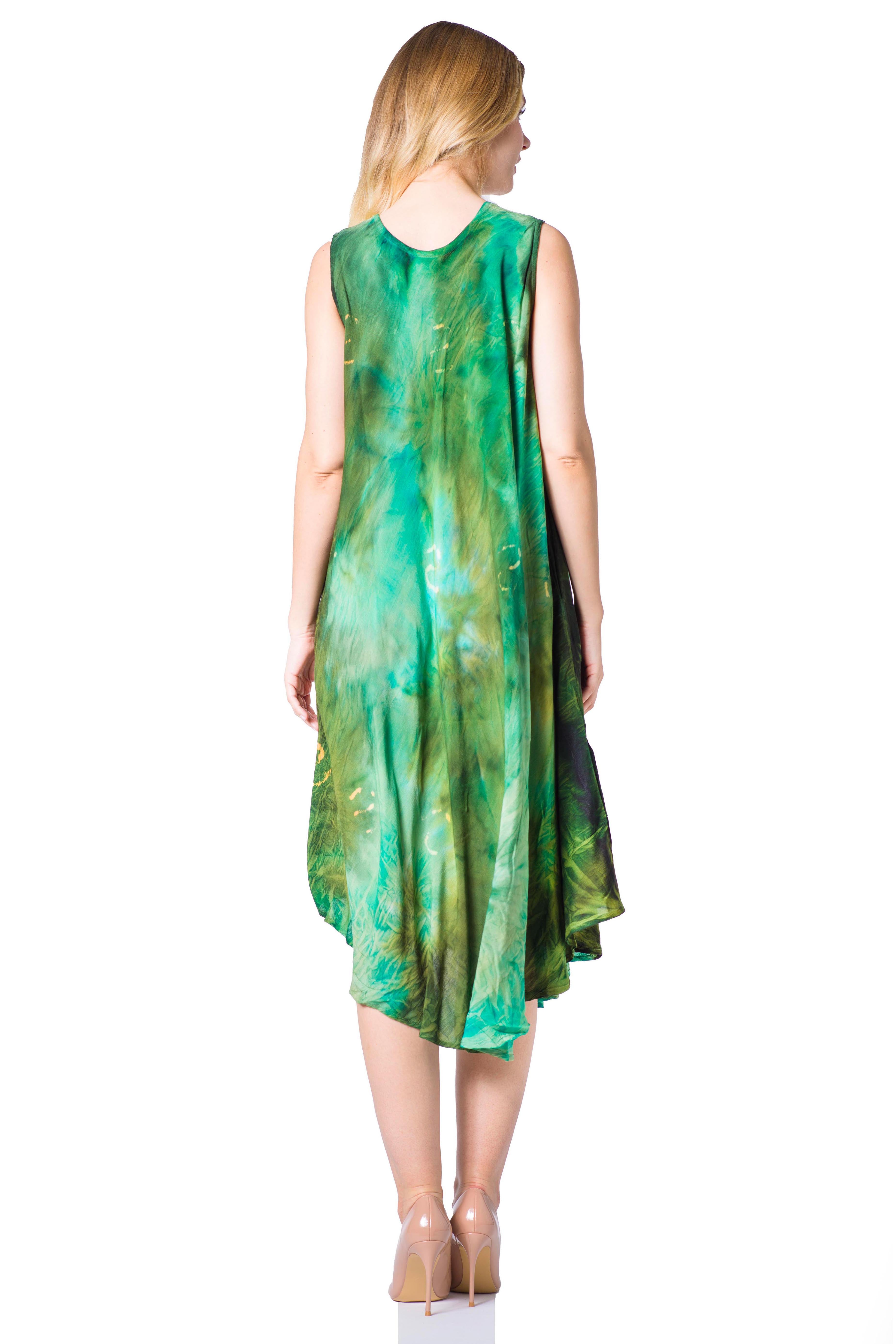 Woman wearing a green sleeveless dress on a white background