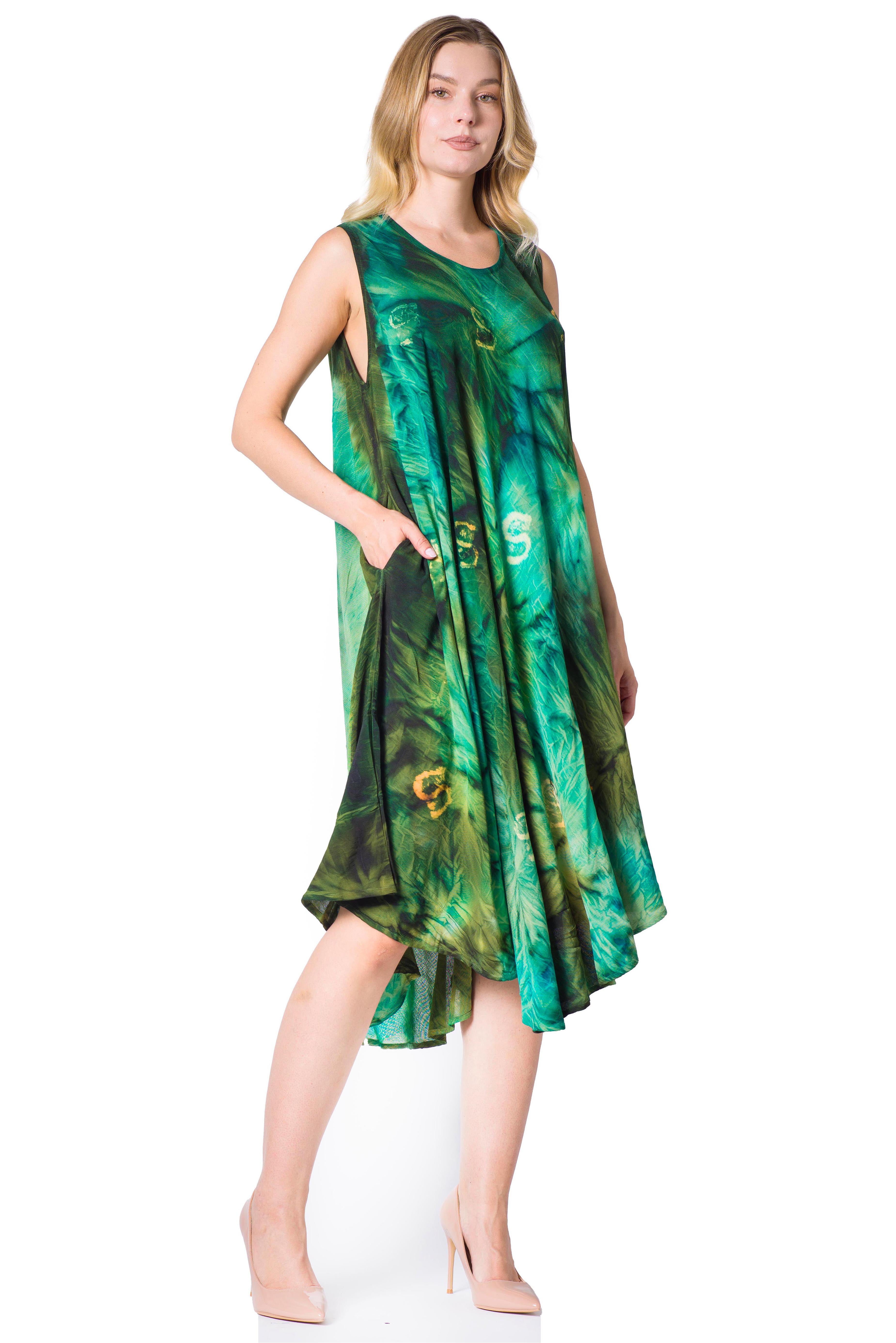 Woman wearing a green patterned dress on a white background