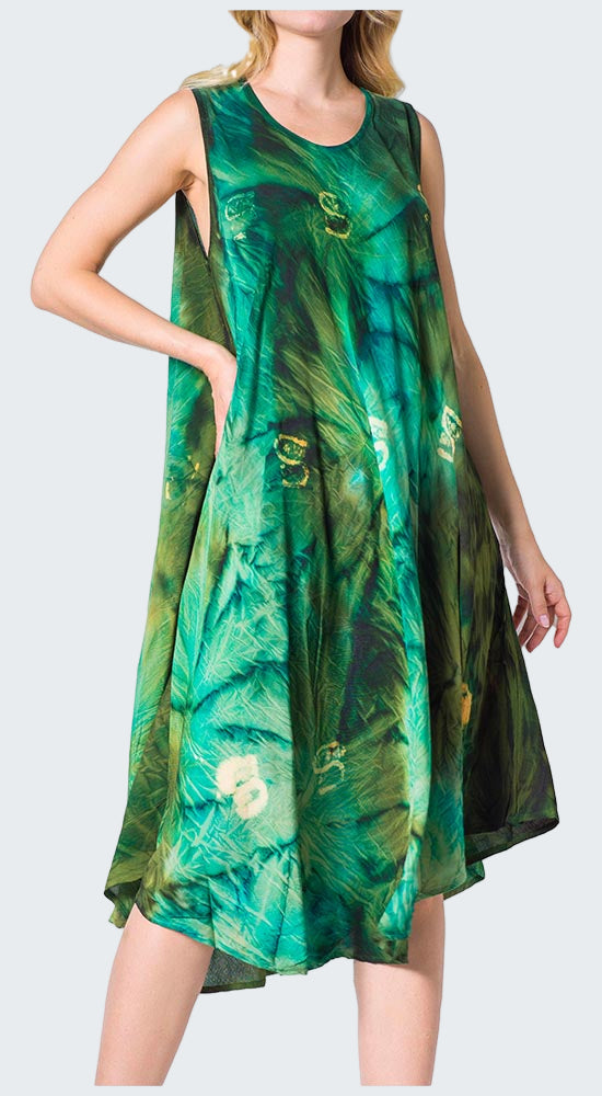 Green floral dress worn by a model on a white background