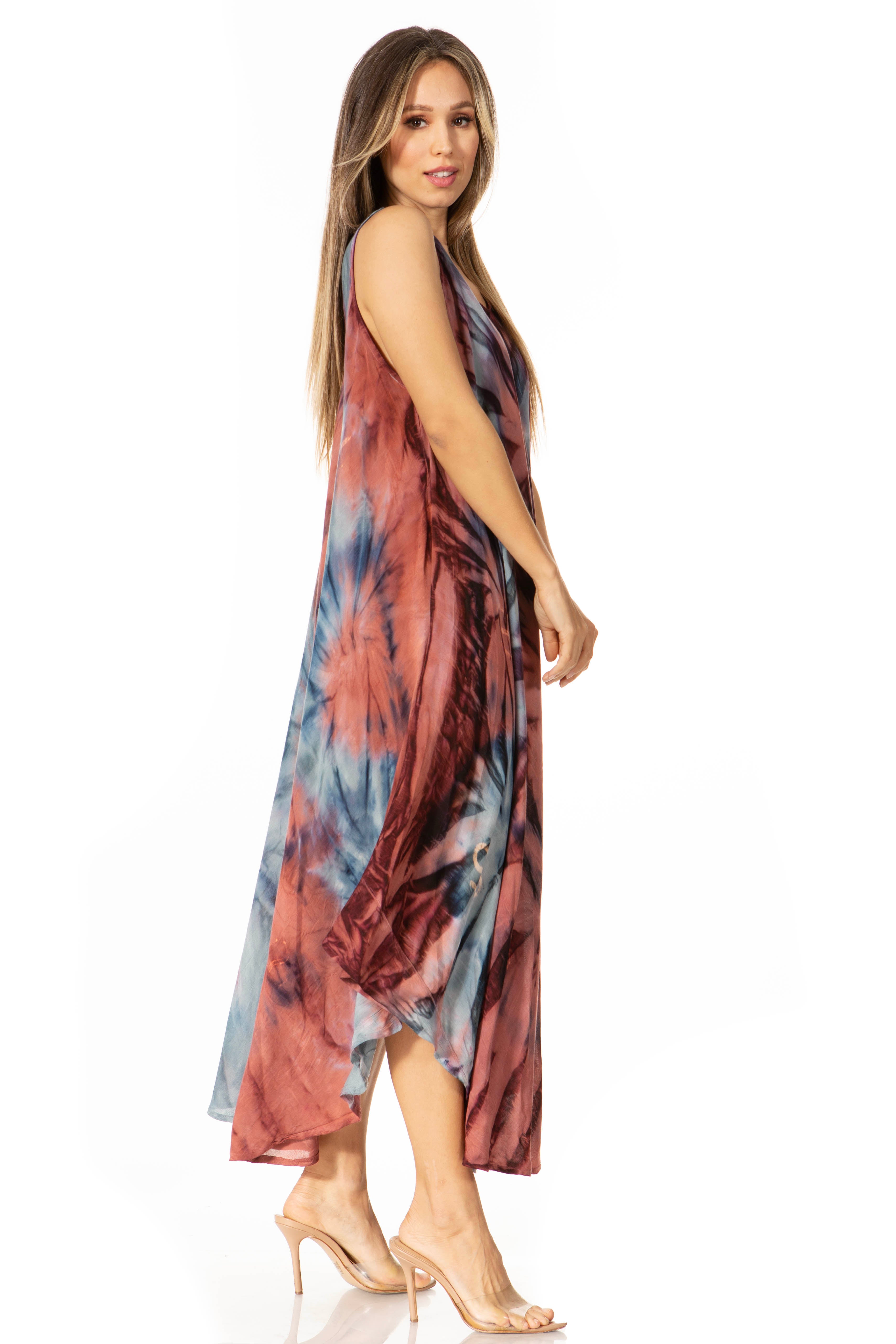 Woman wearing a tie-dye dress on a white background