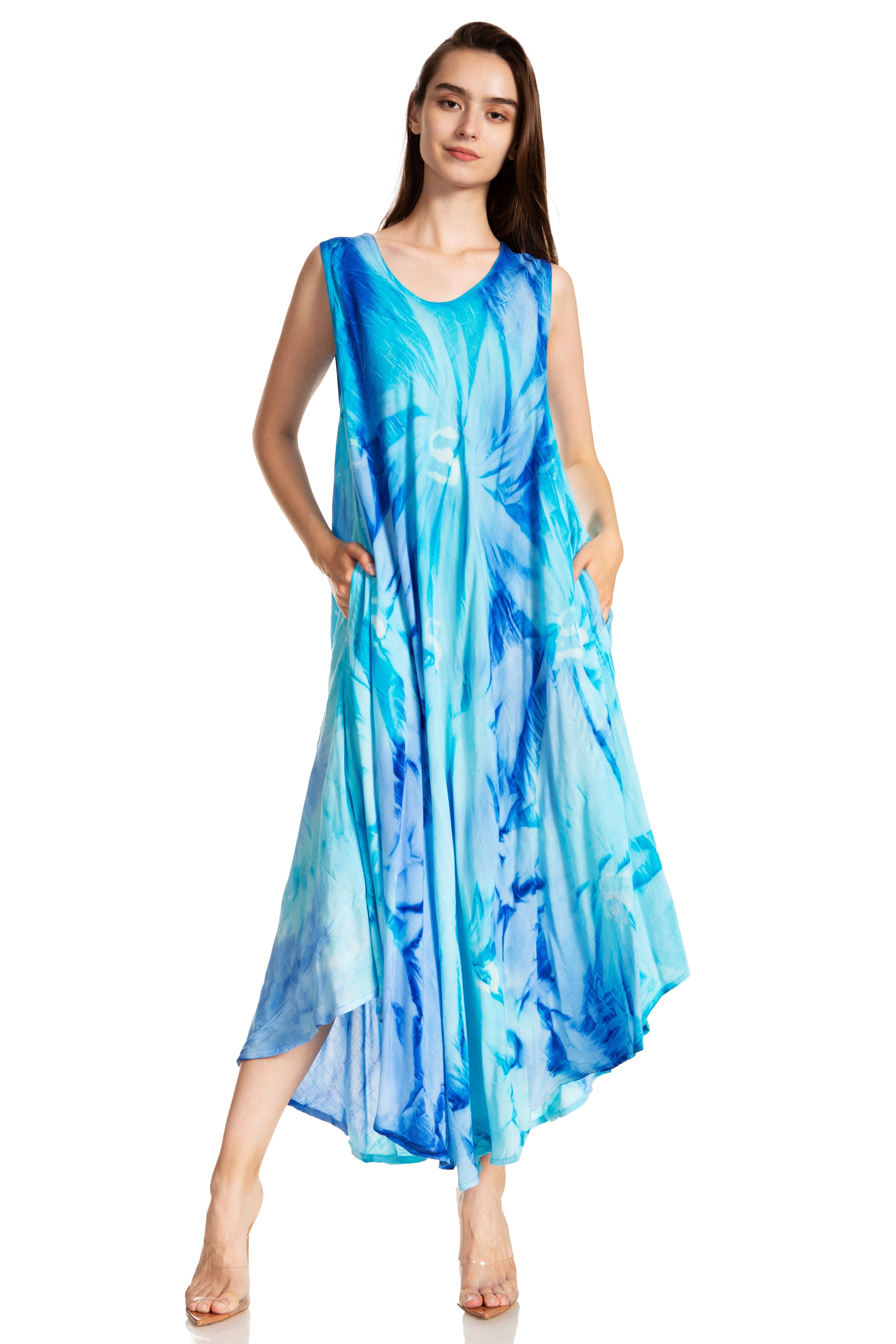 Woman wearing a blue tie-dye dress on a white background