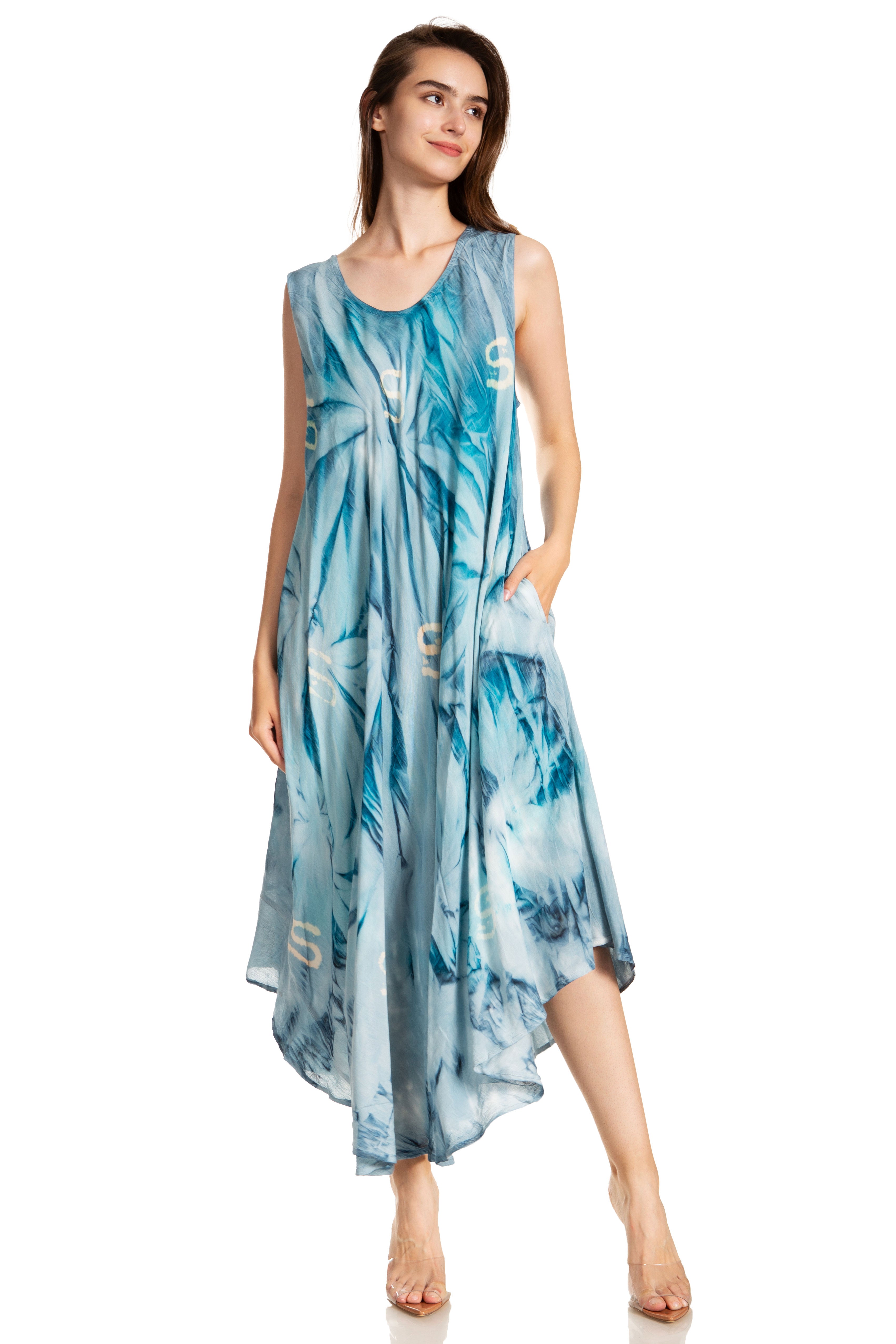 Woman wearing a blue tie-dye dress on a white background