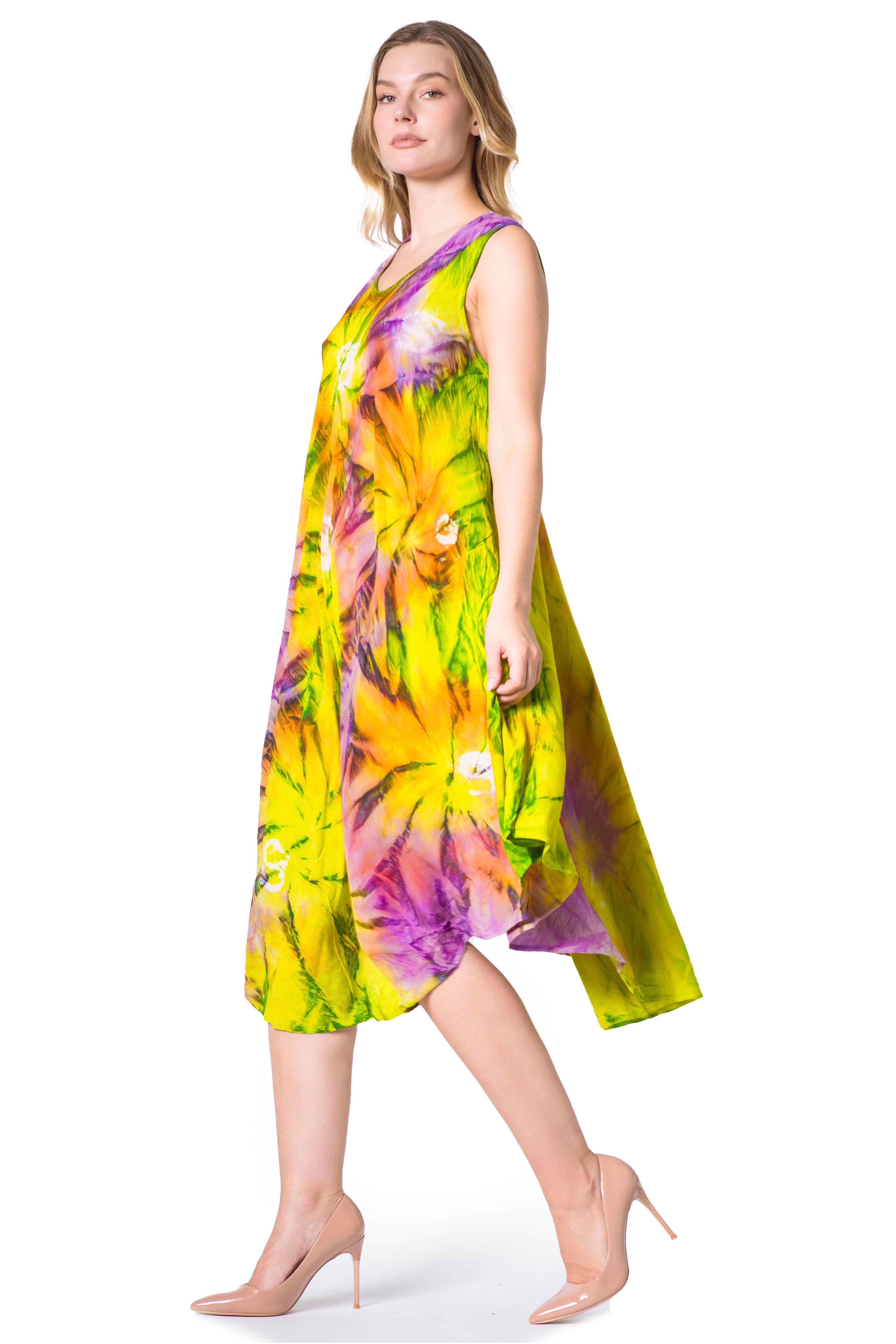 Woman wearing a colorful tie-dye dress on a white background