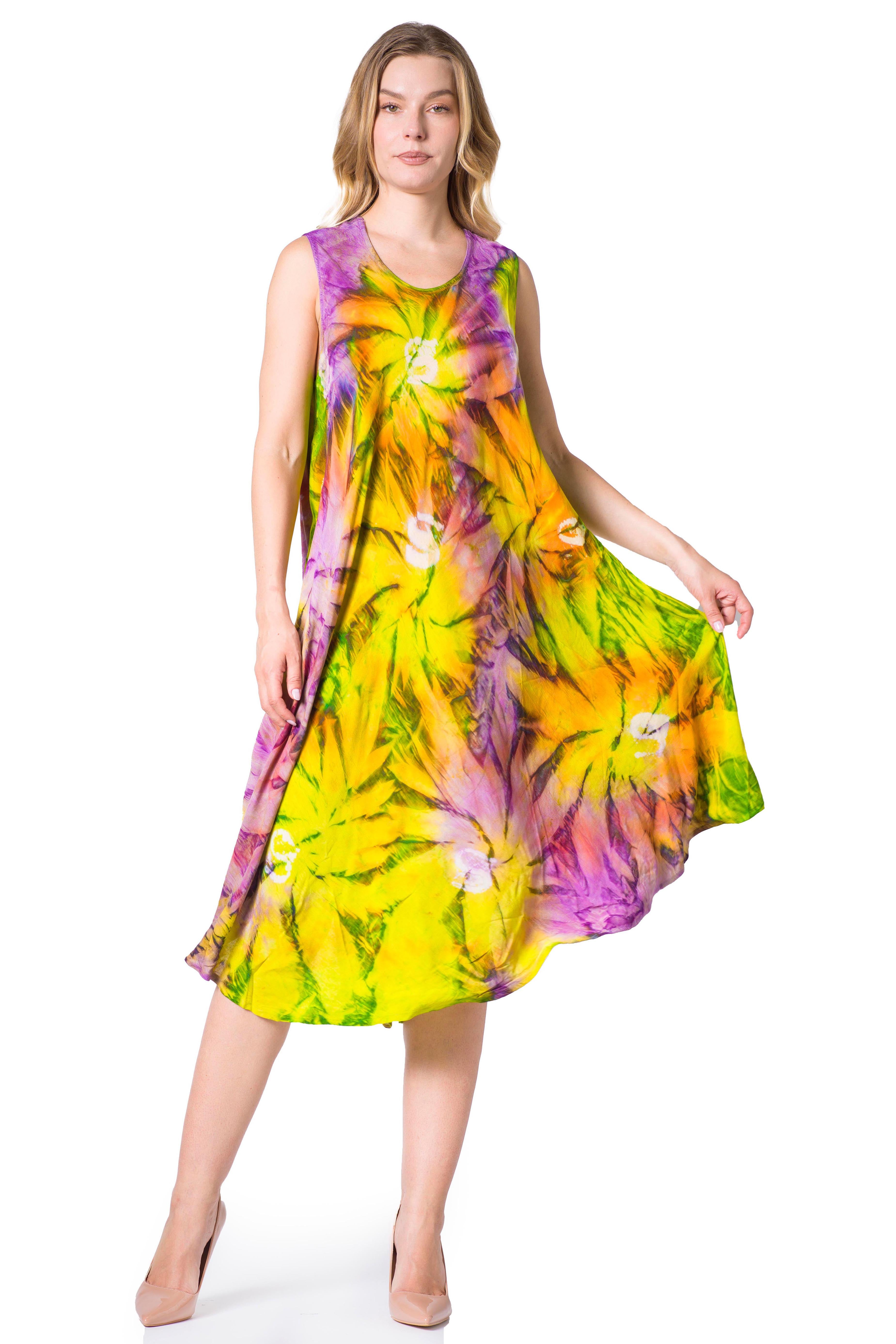 Woman wearing a colorful tie-dye dress on a white background