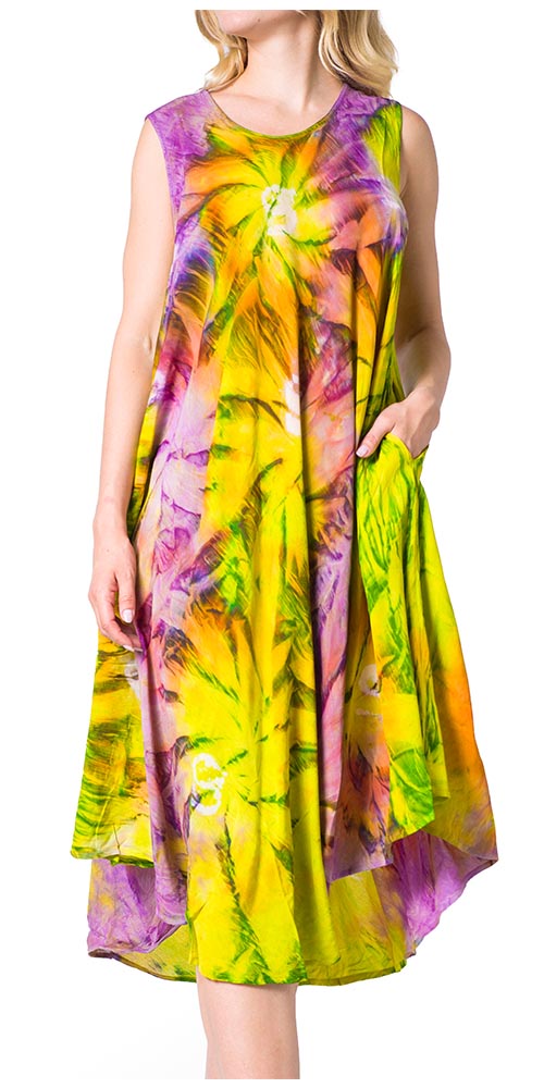 Woman wearing a colorful tie-dye dress on a white background