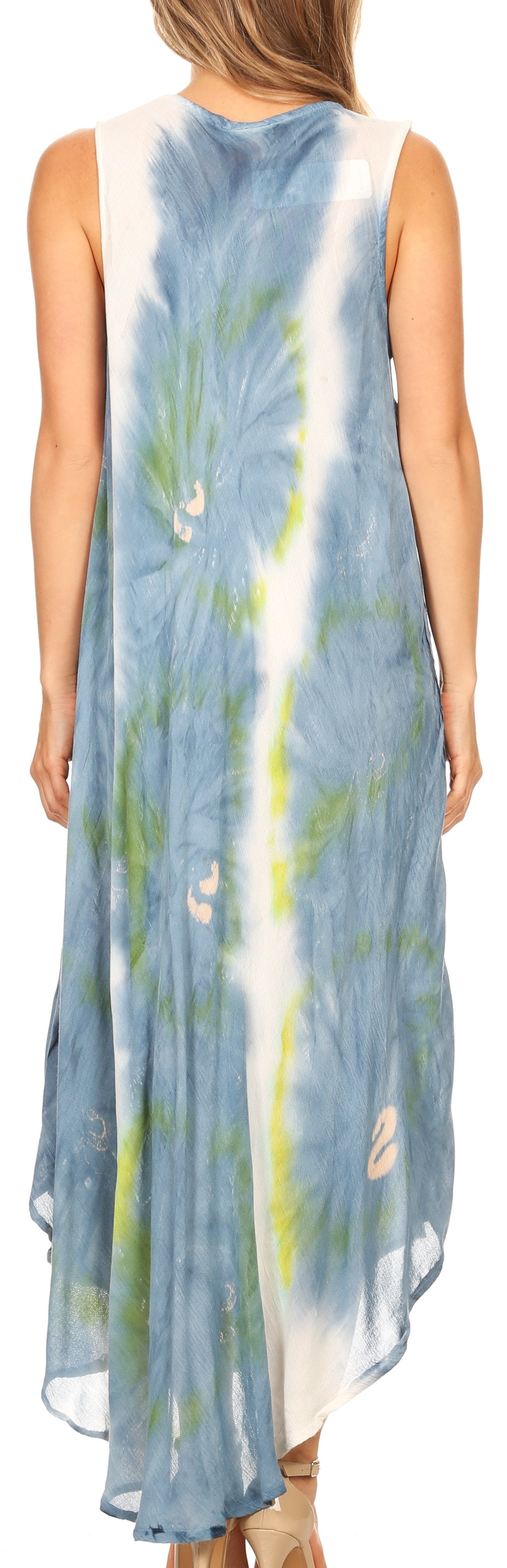 Woman wearing a sleeveless, tie-dye dress with a blue and green pattern.