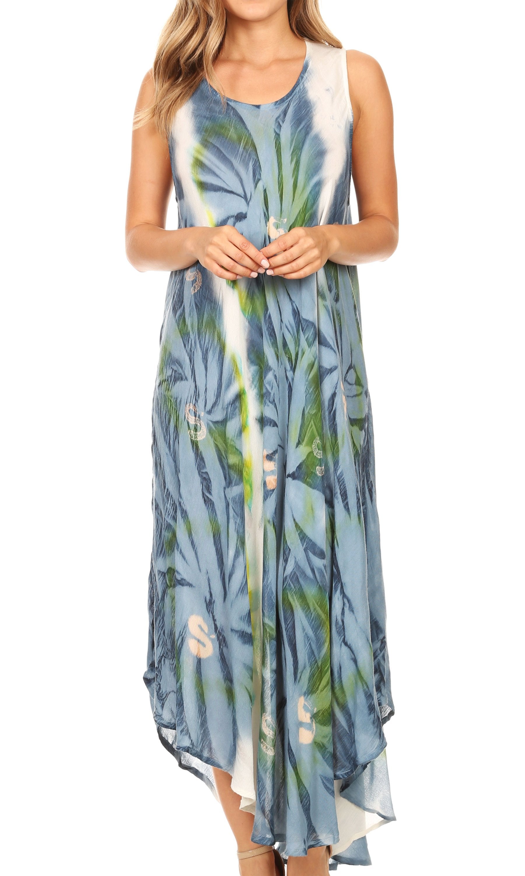 Woman wearing a blue and green floral dress on a white background