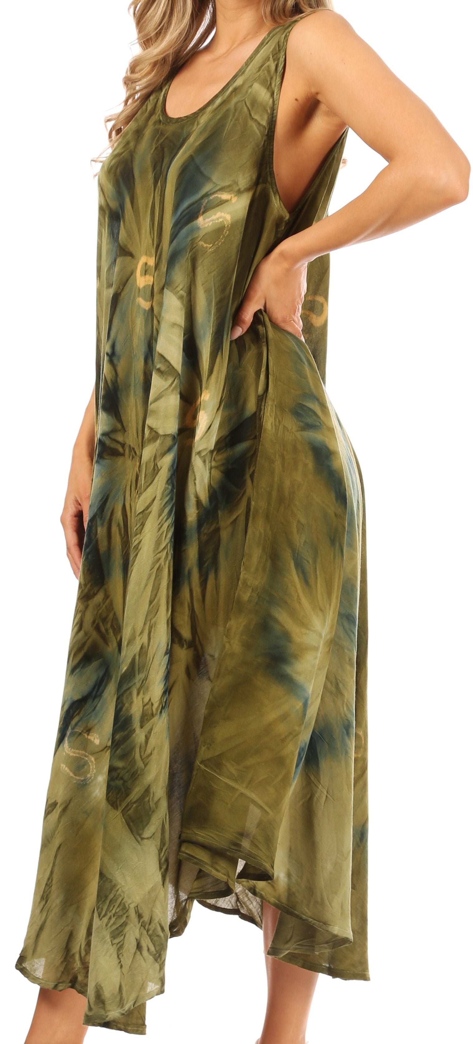 Woman wearing a green tie-dye dress on a white background