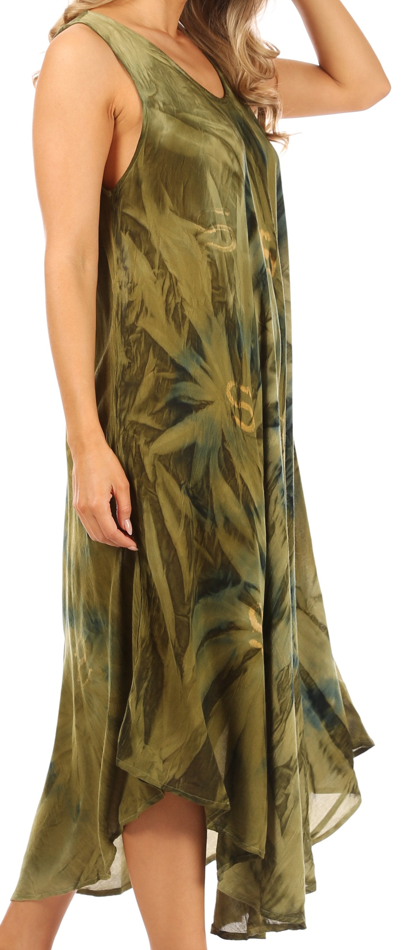 Woman wearing a green leaf-patterned dress on a white background