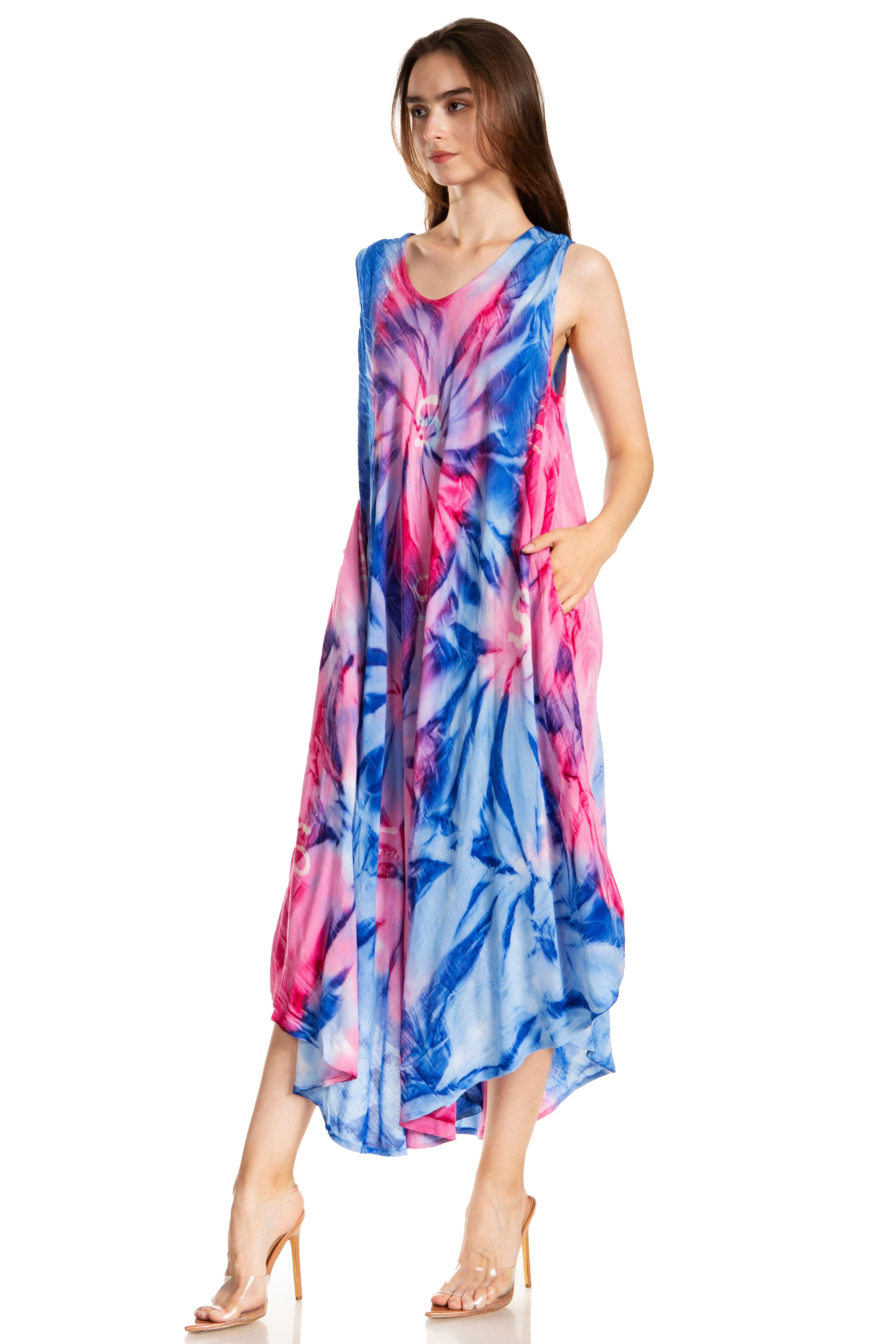 Woman wearing a colorful tie-dye dress on a white background