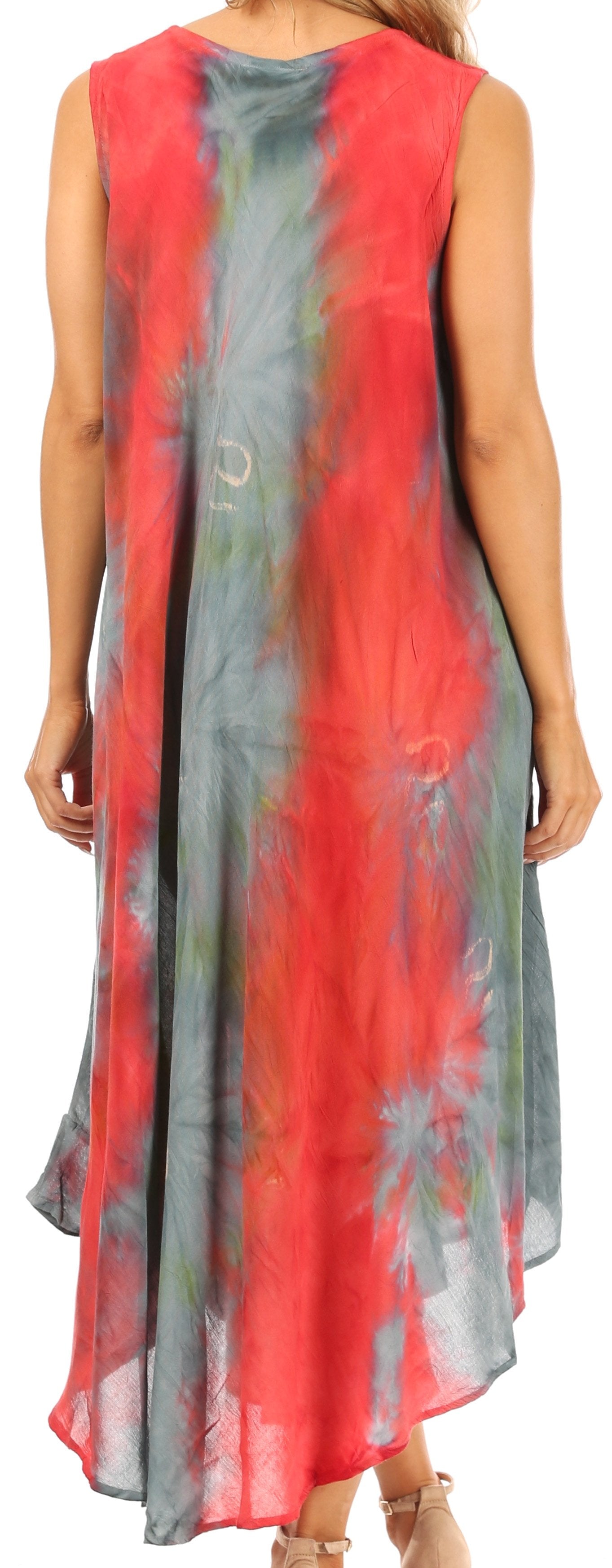 Woman wearing a sleeveless dress with a red and gray tie-dye pattern.