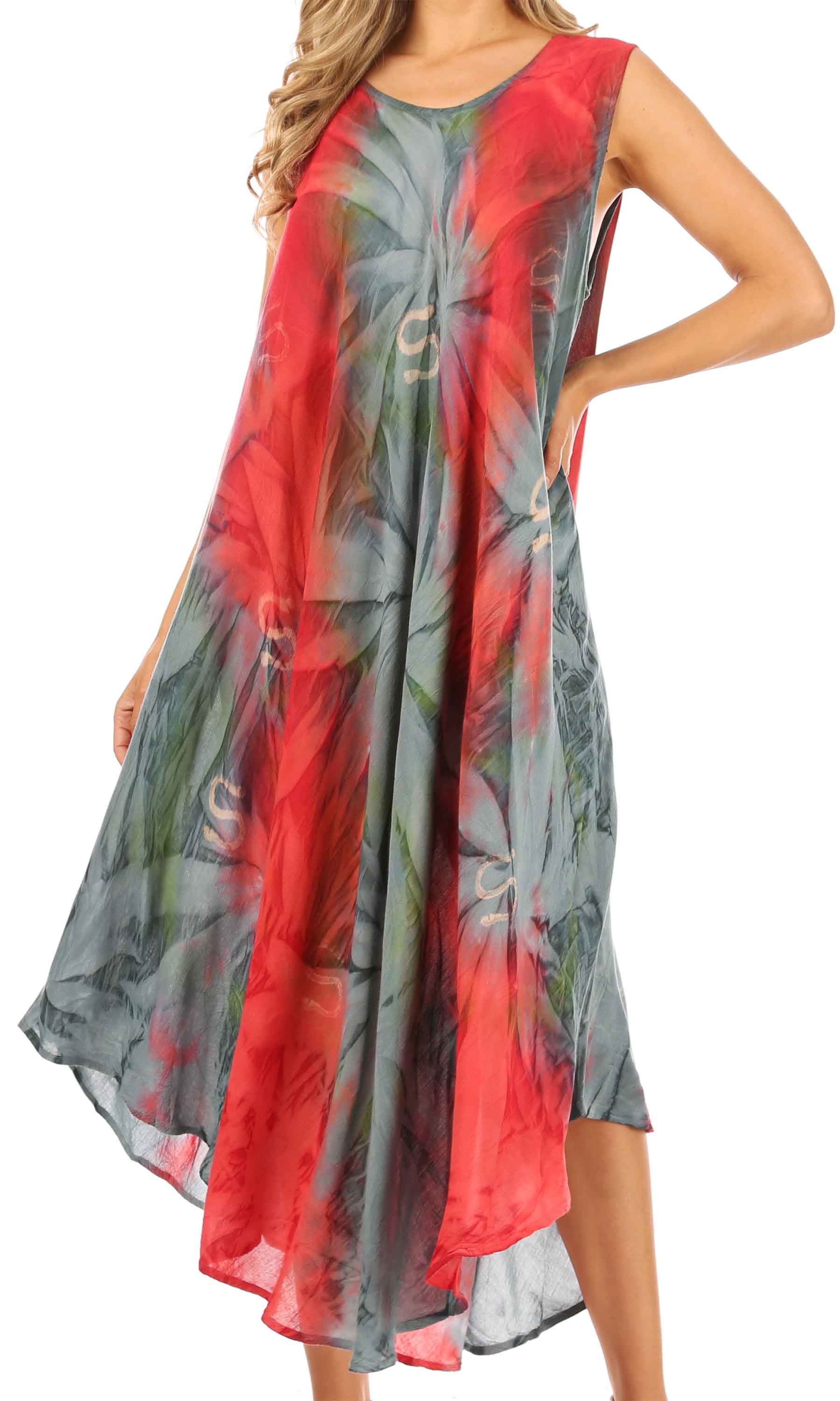 Woman wearing a colorful dress with a red and gray pattern on a white background