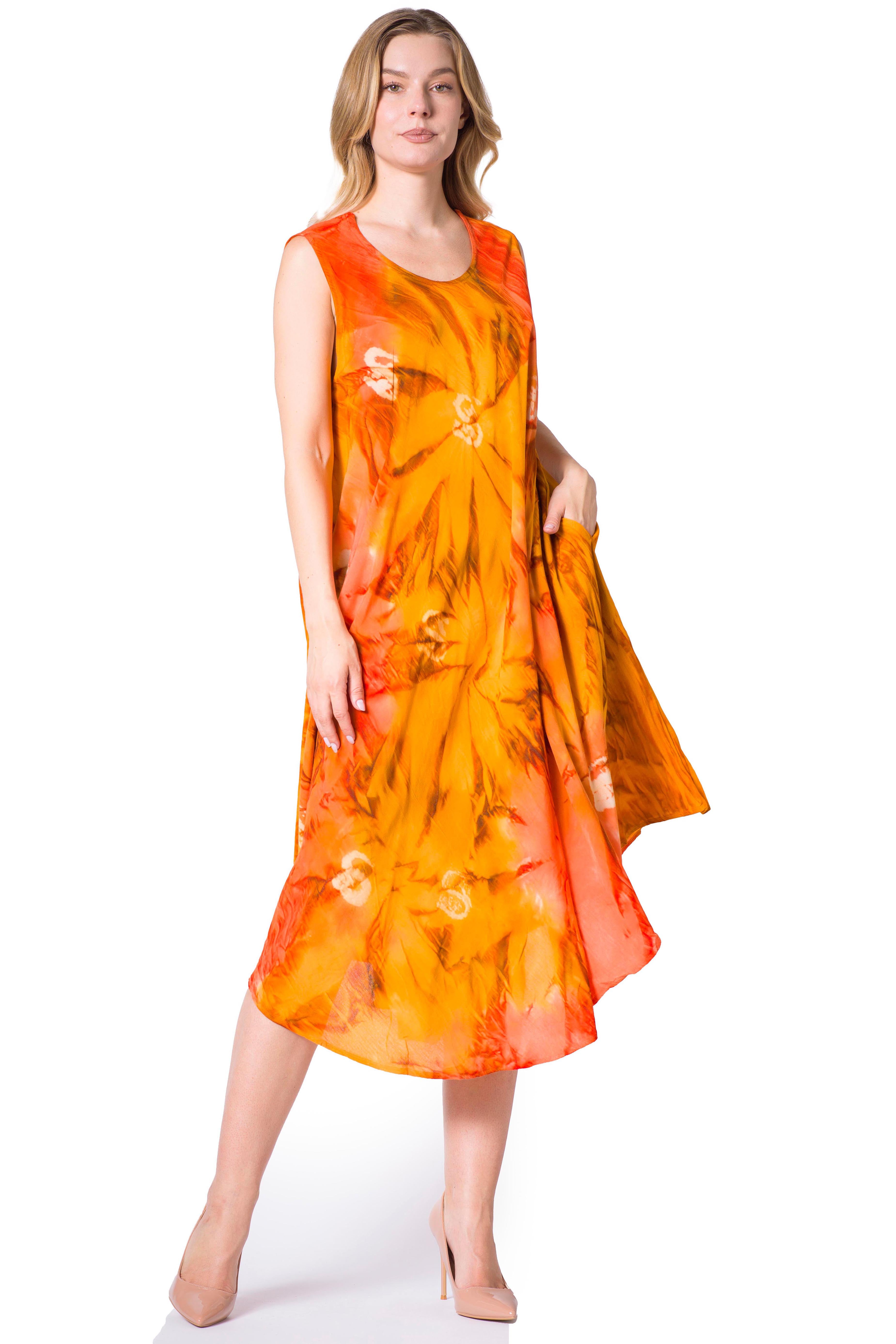 Woman wearing an orange floral dress on a white background