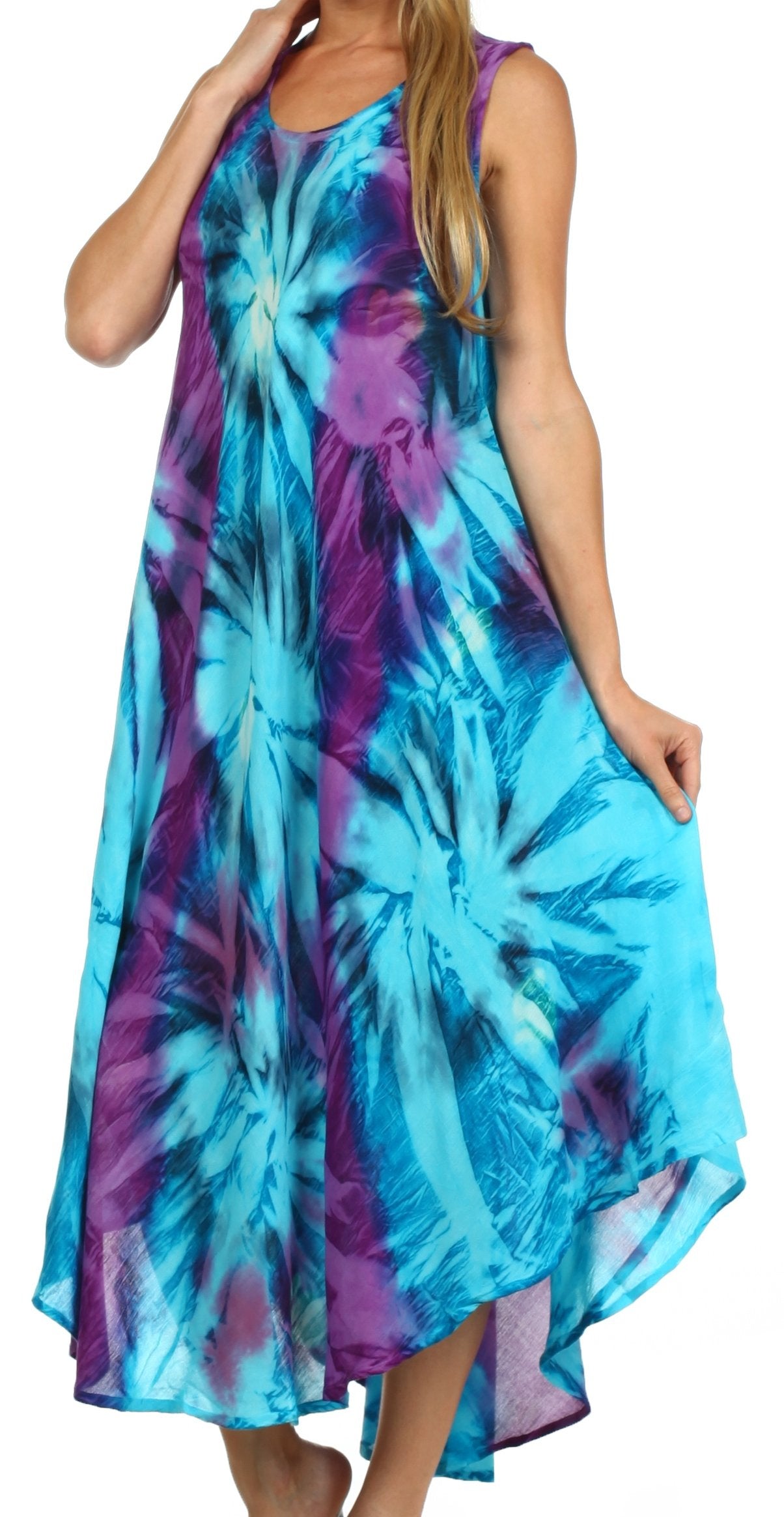Woman wearing a tie-dye dress with blue and purple patterns on a white background
