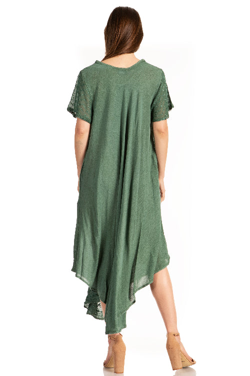 Woman wearing a green dress with a white background