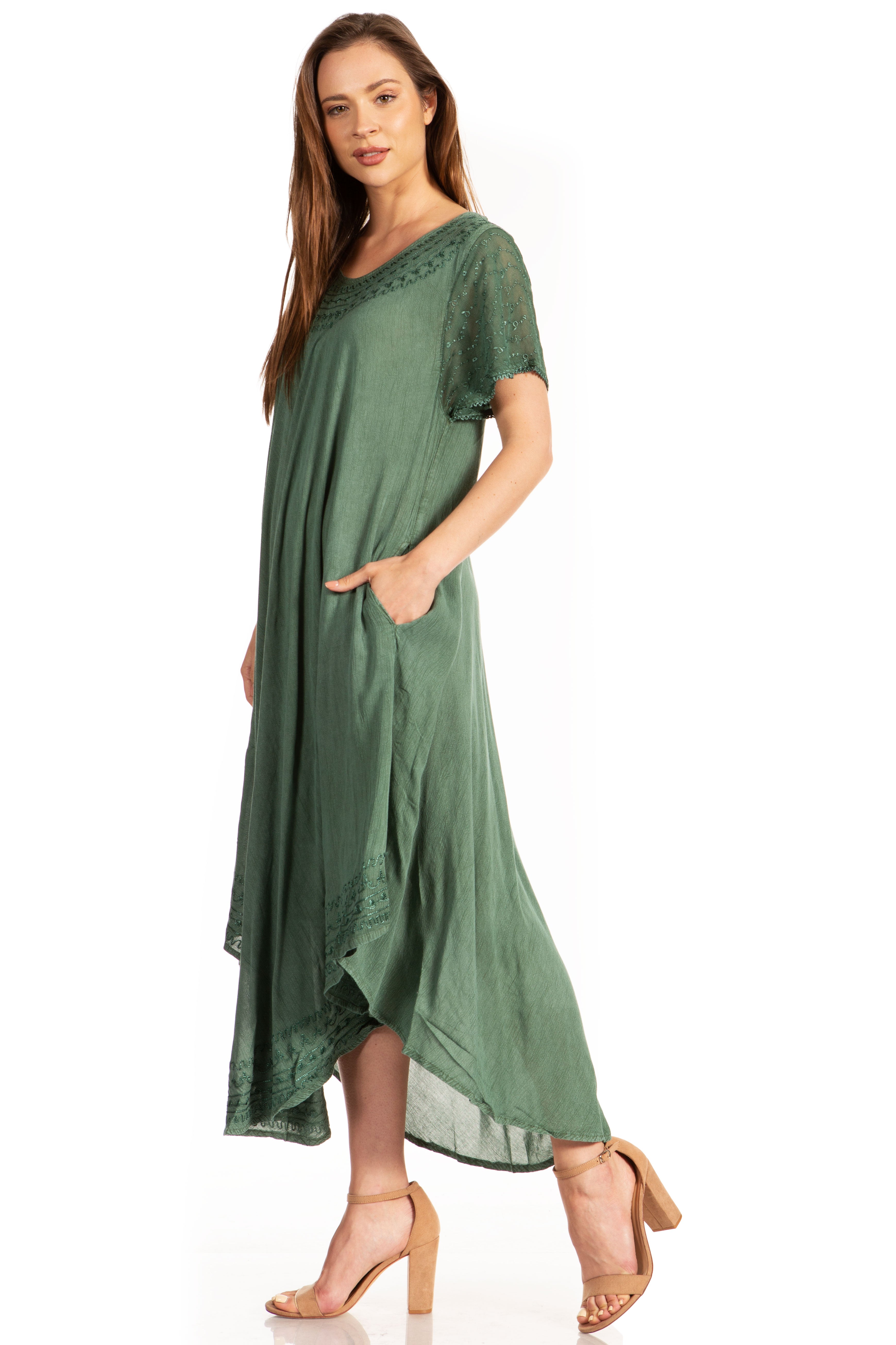 Woman wearing a green dress on a white background