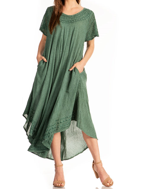Green dress with short sleeves and pockets on a white background