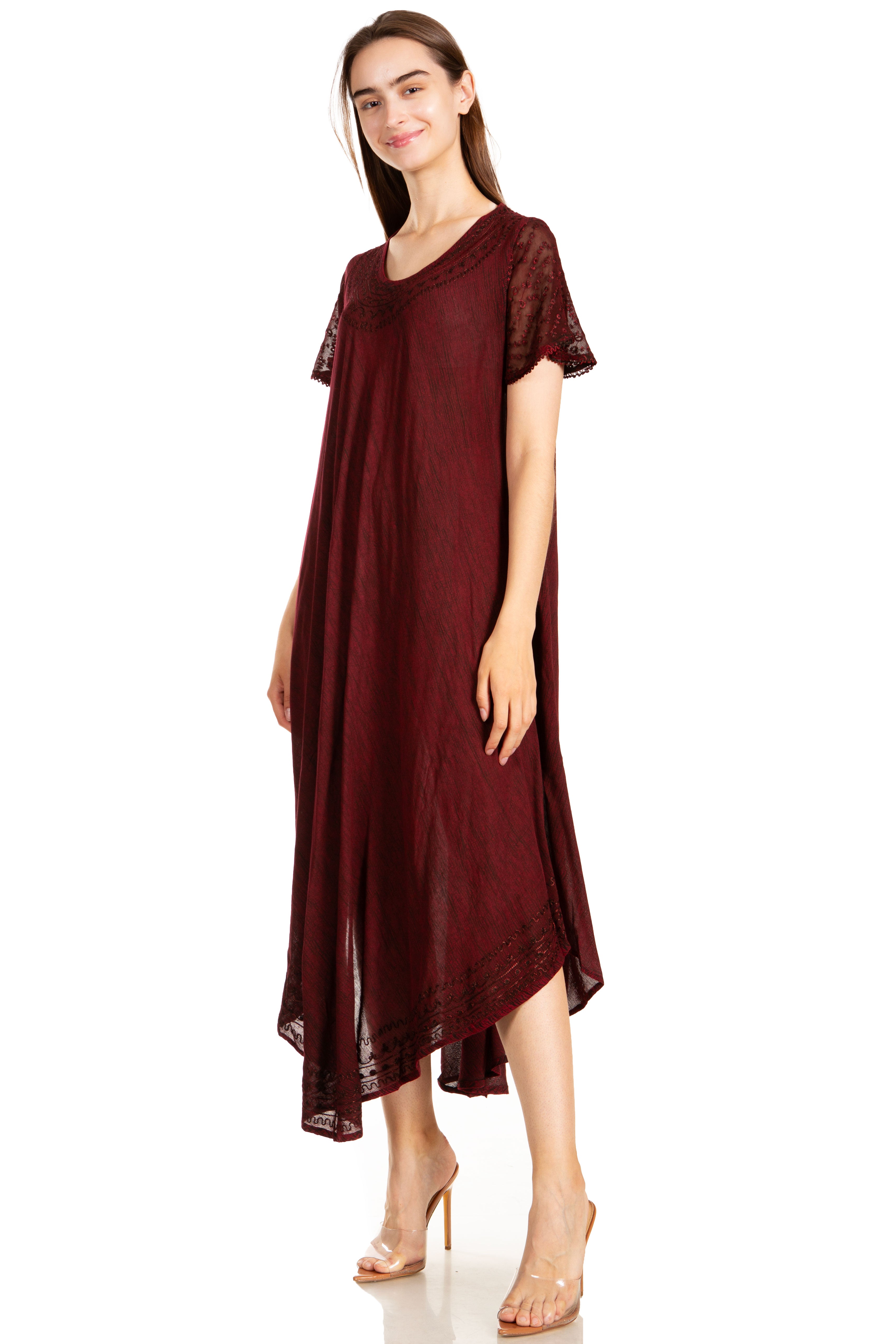 Woman wearing a burgundy dress on a white background