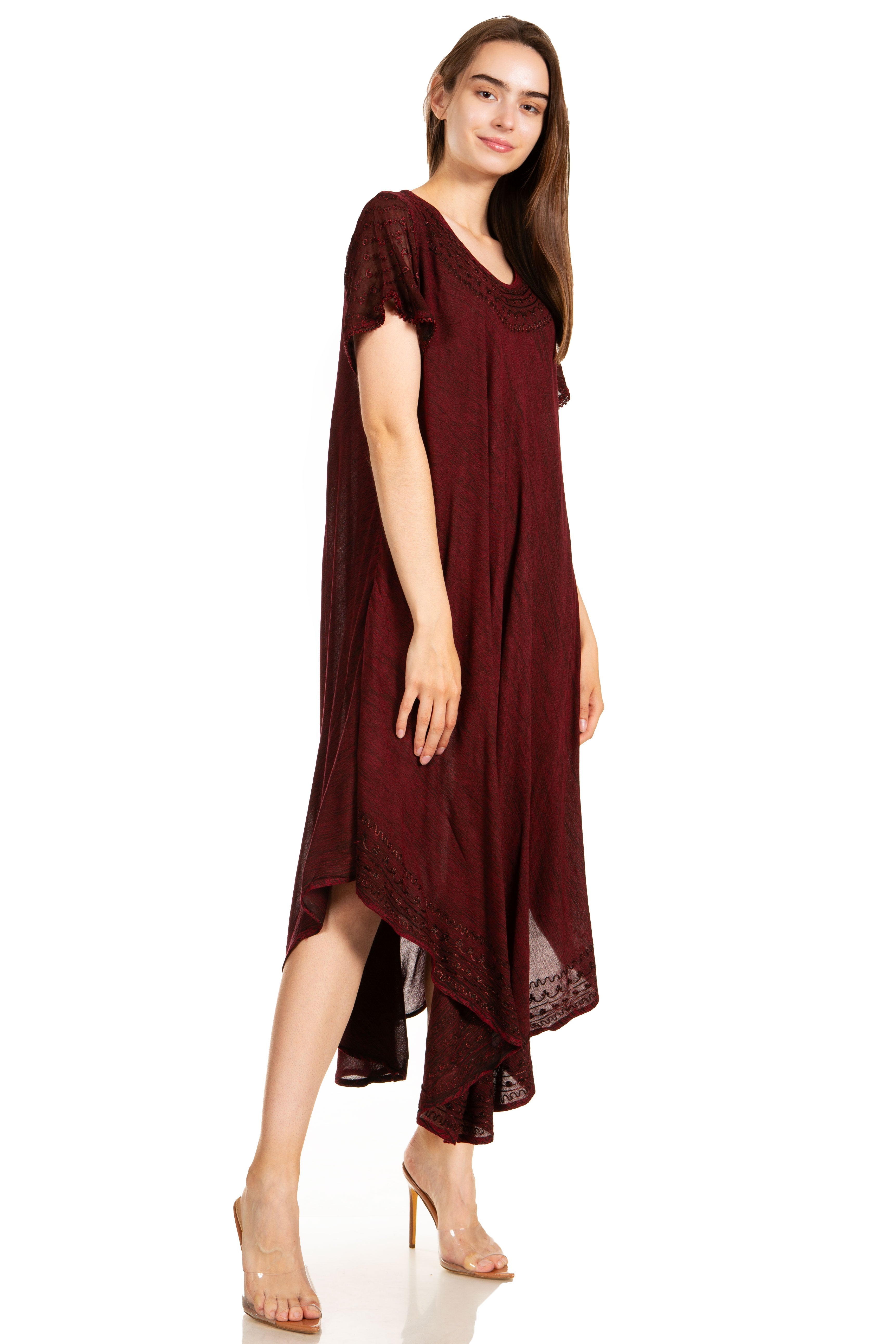 Woman wearing a burgundy dress on a white background