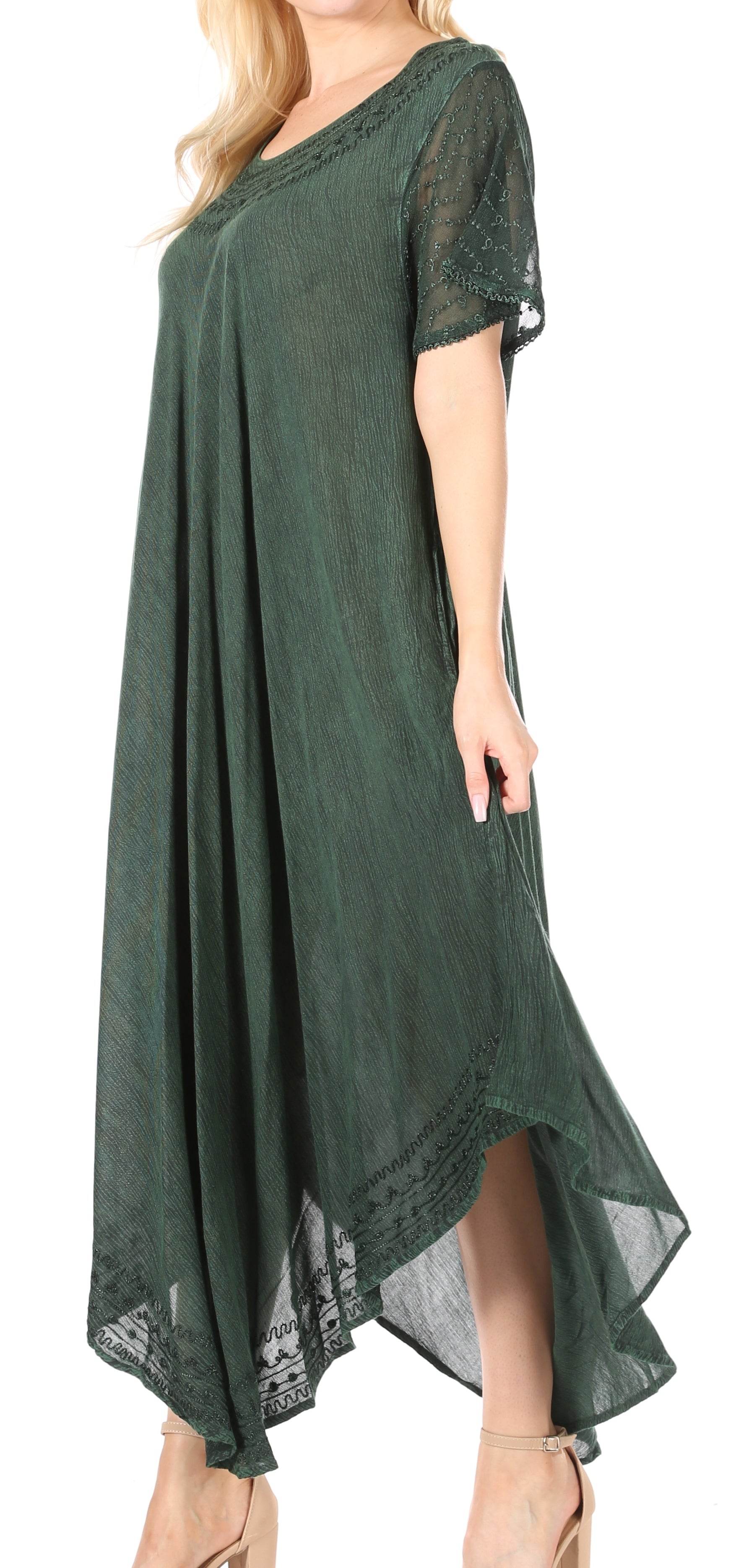 Green dress with lace details on a white background