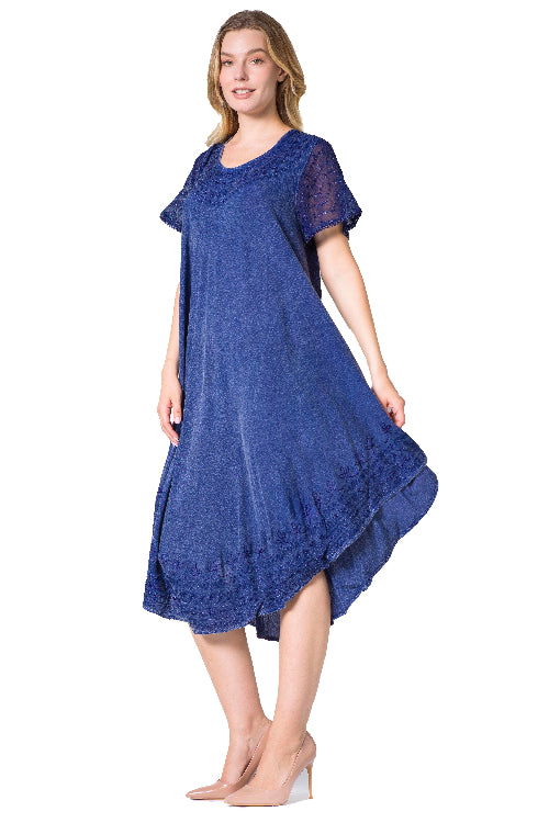 Woman wearing a blue dress on a white background