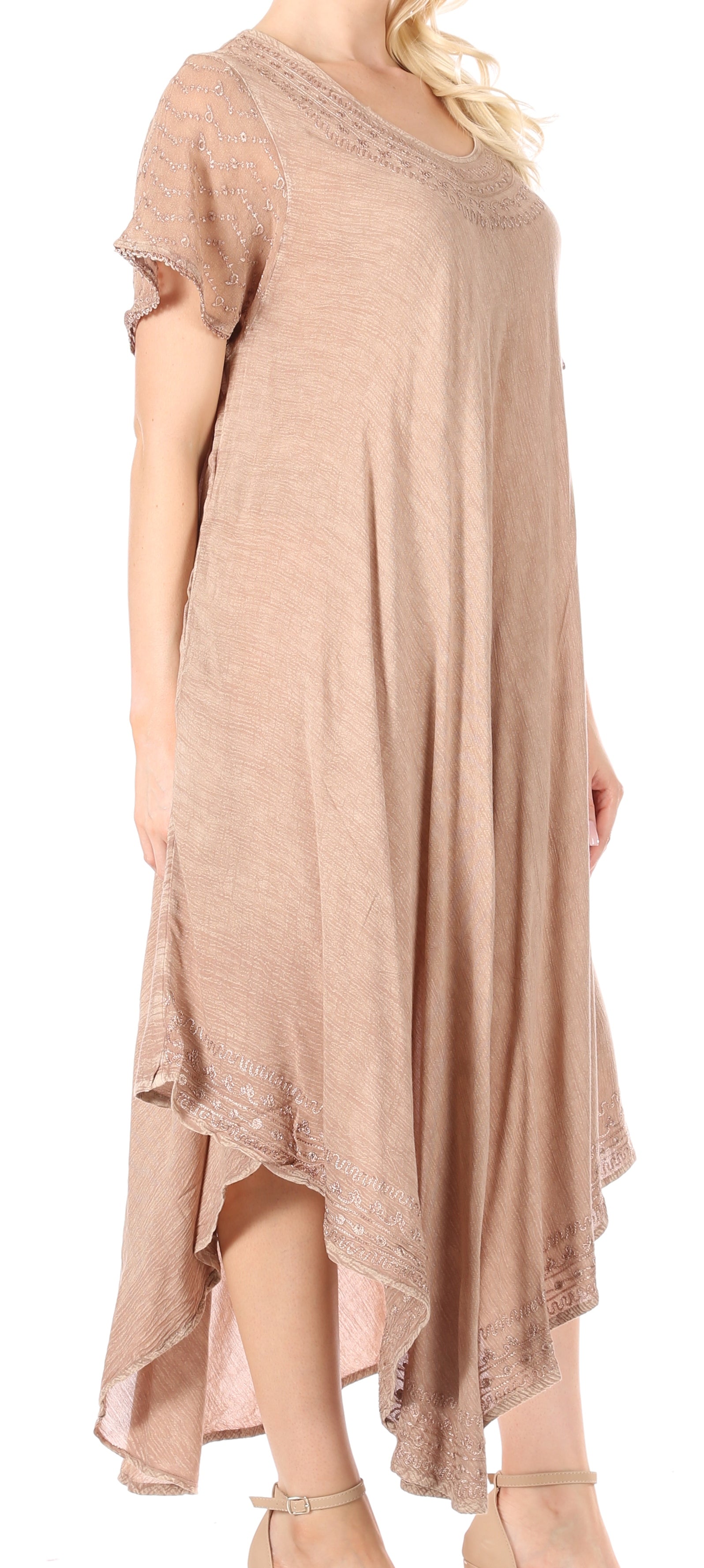 Beige dress with lace details on a white background
