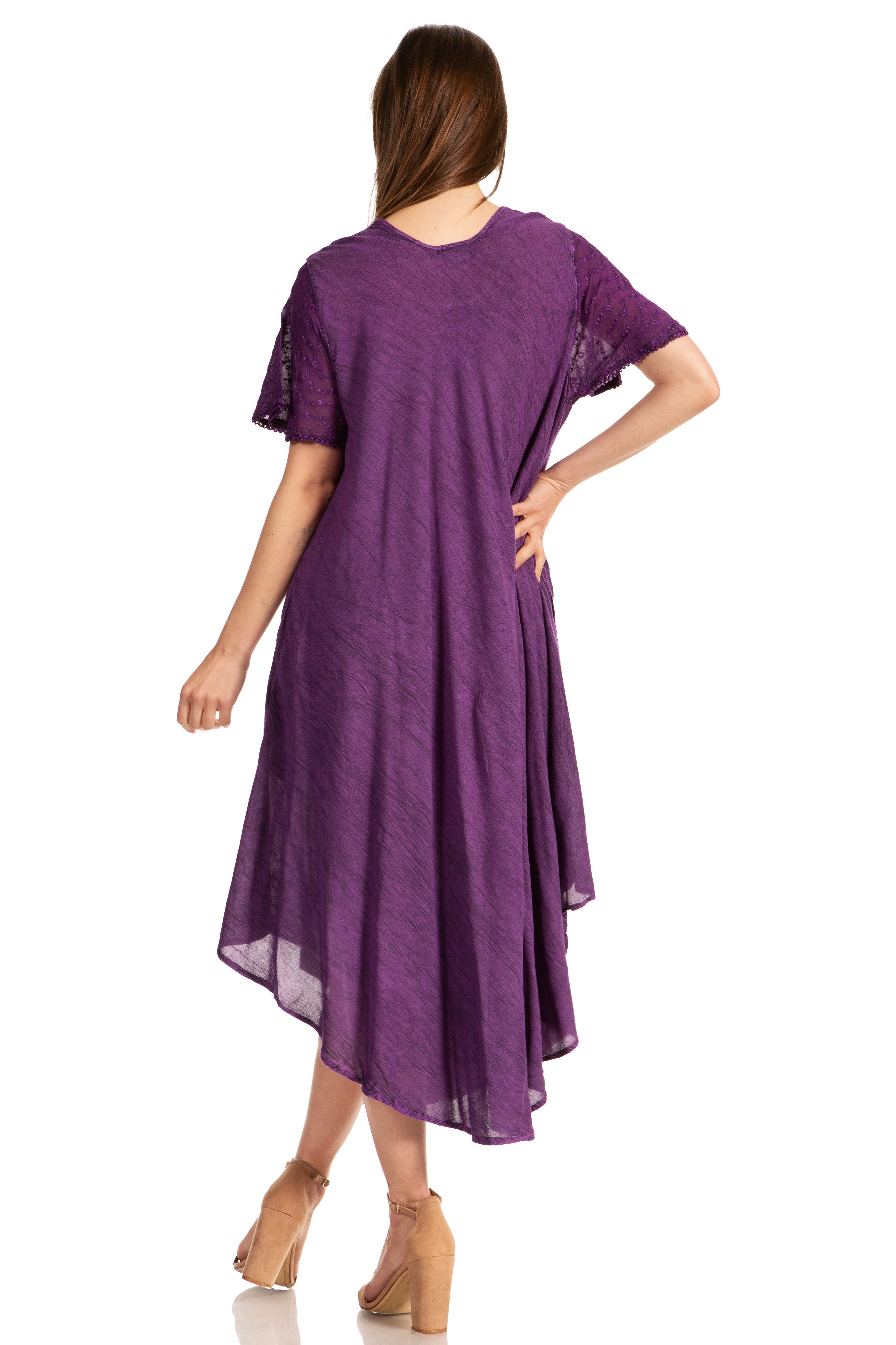 Woman wearing a purple dress on a white background