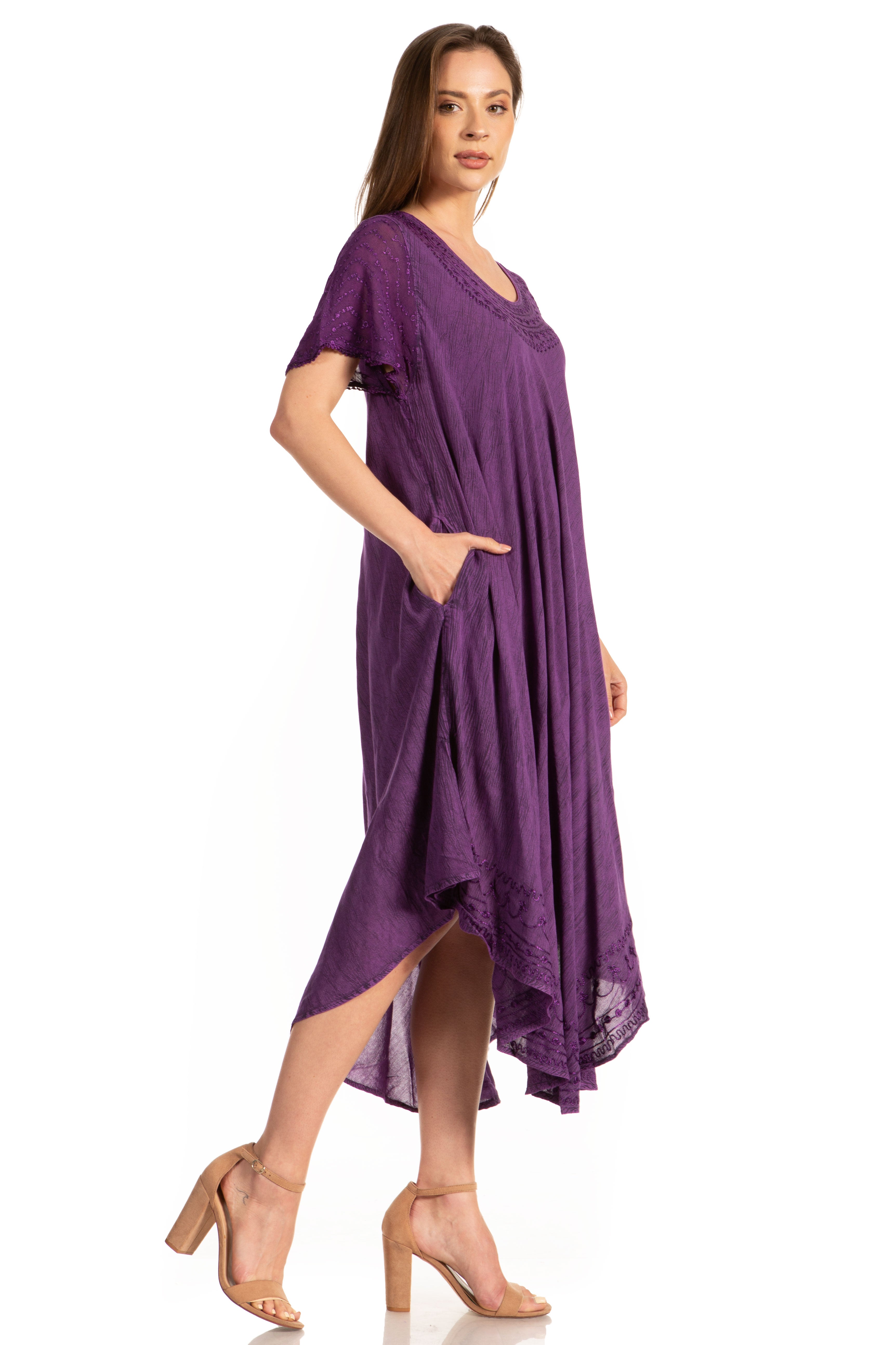 Woman wearing a purple dress on a white background