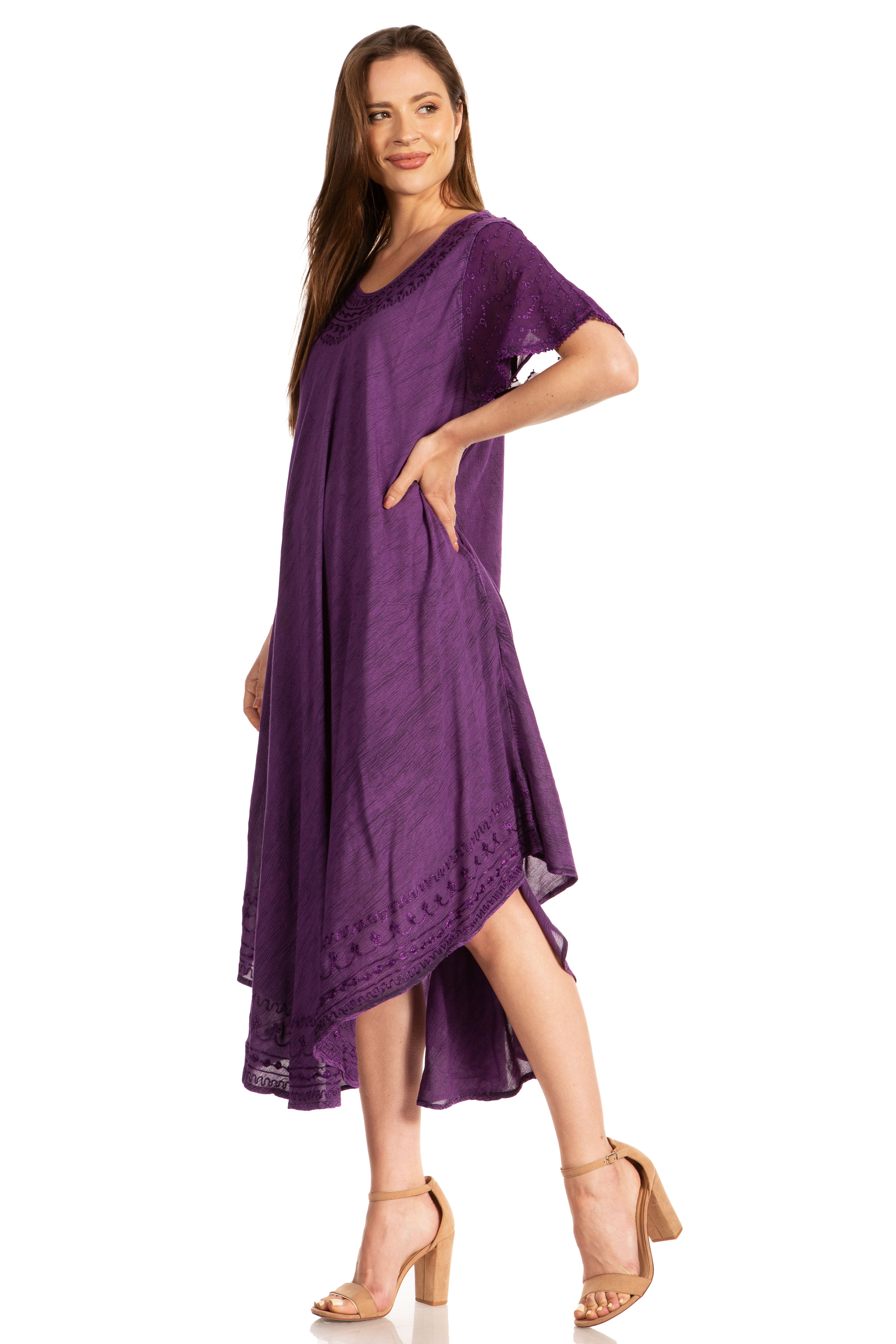 Woman wearing a purple dress on a white background