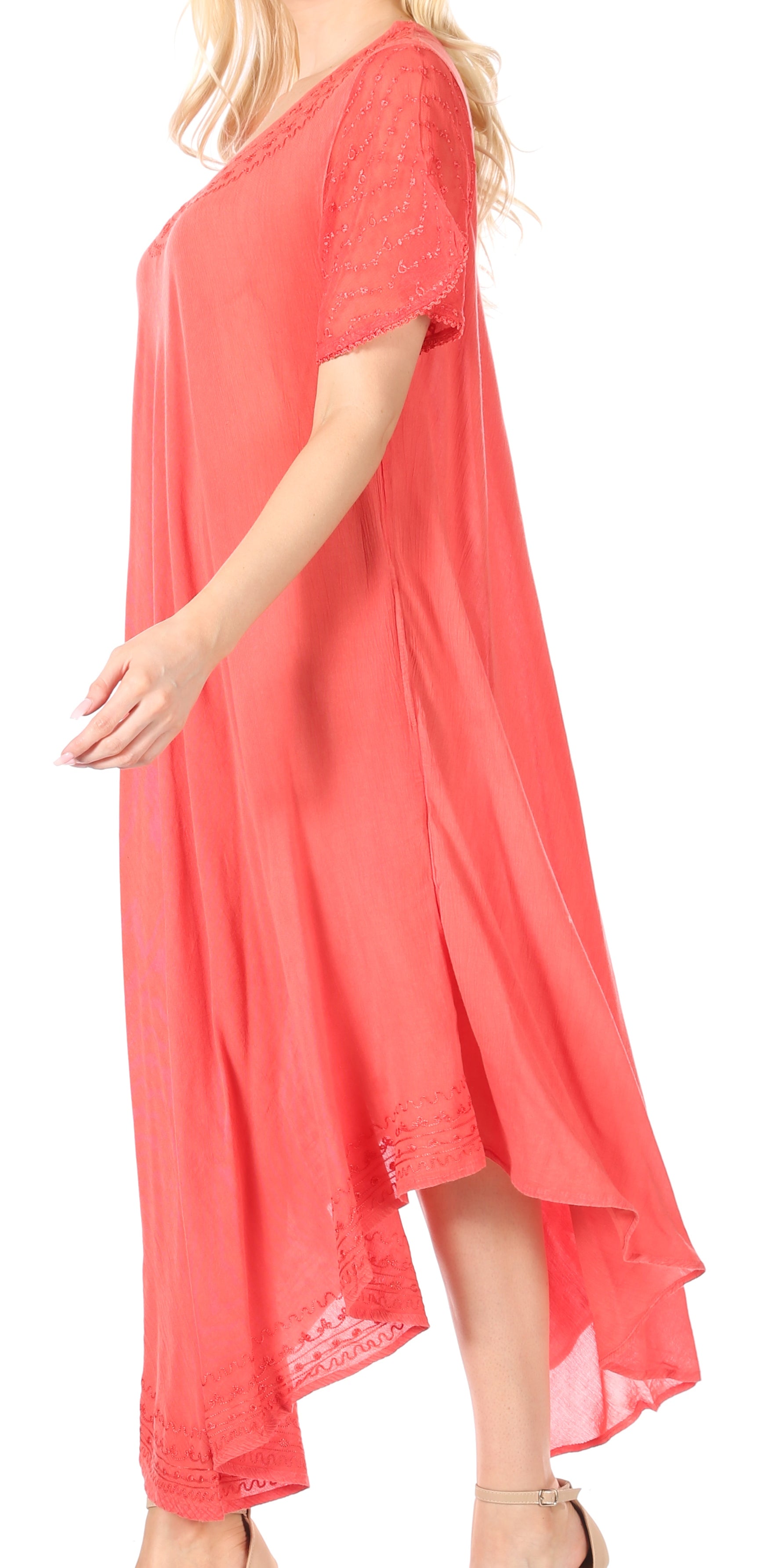 Coral dress with lace trim on a white background