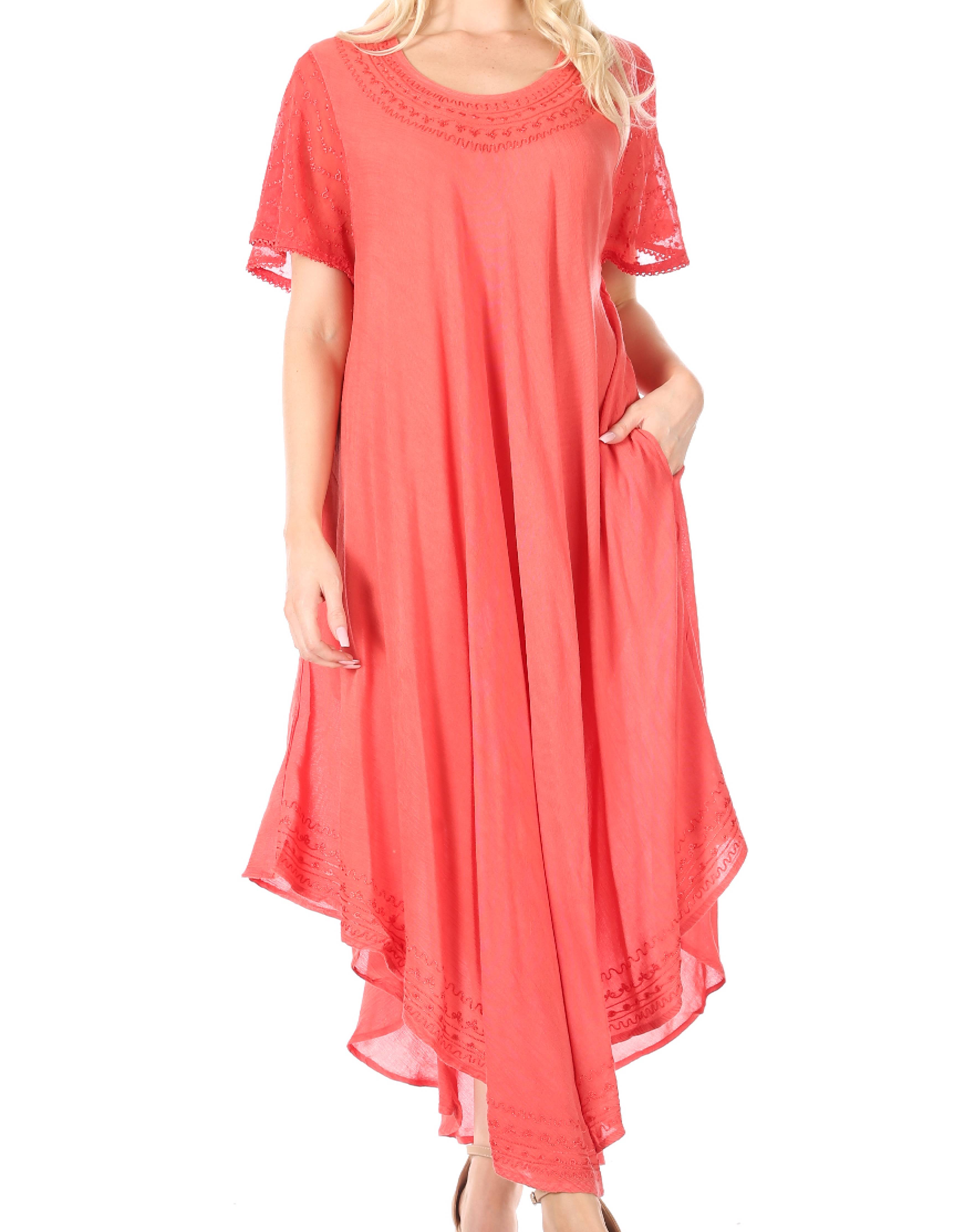 Coral dress with lace details on a white background