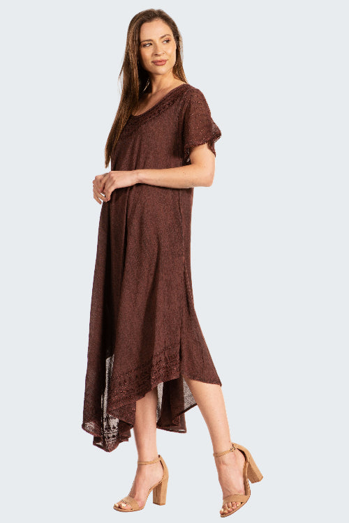Woman wearing a brown dress on a white background