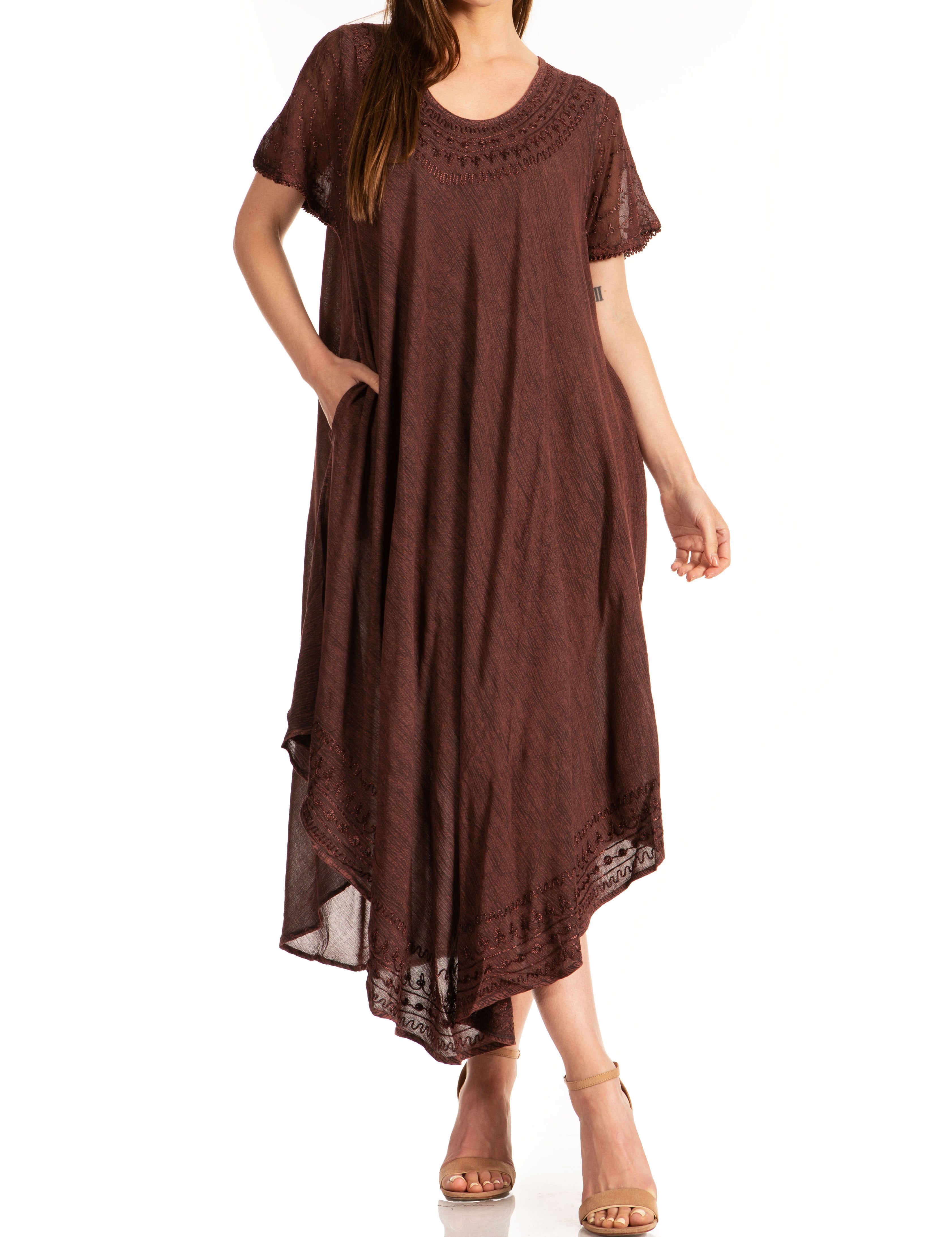 Brown dress worn by a person on a white background