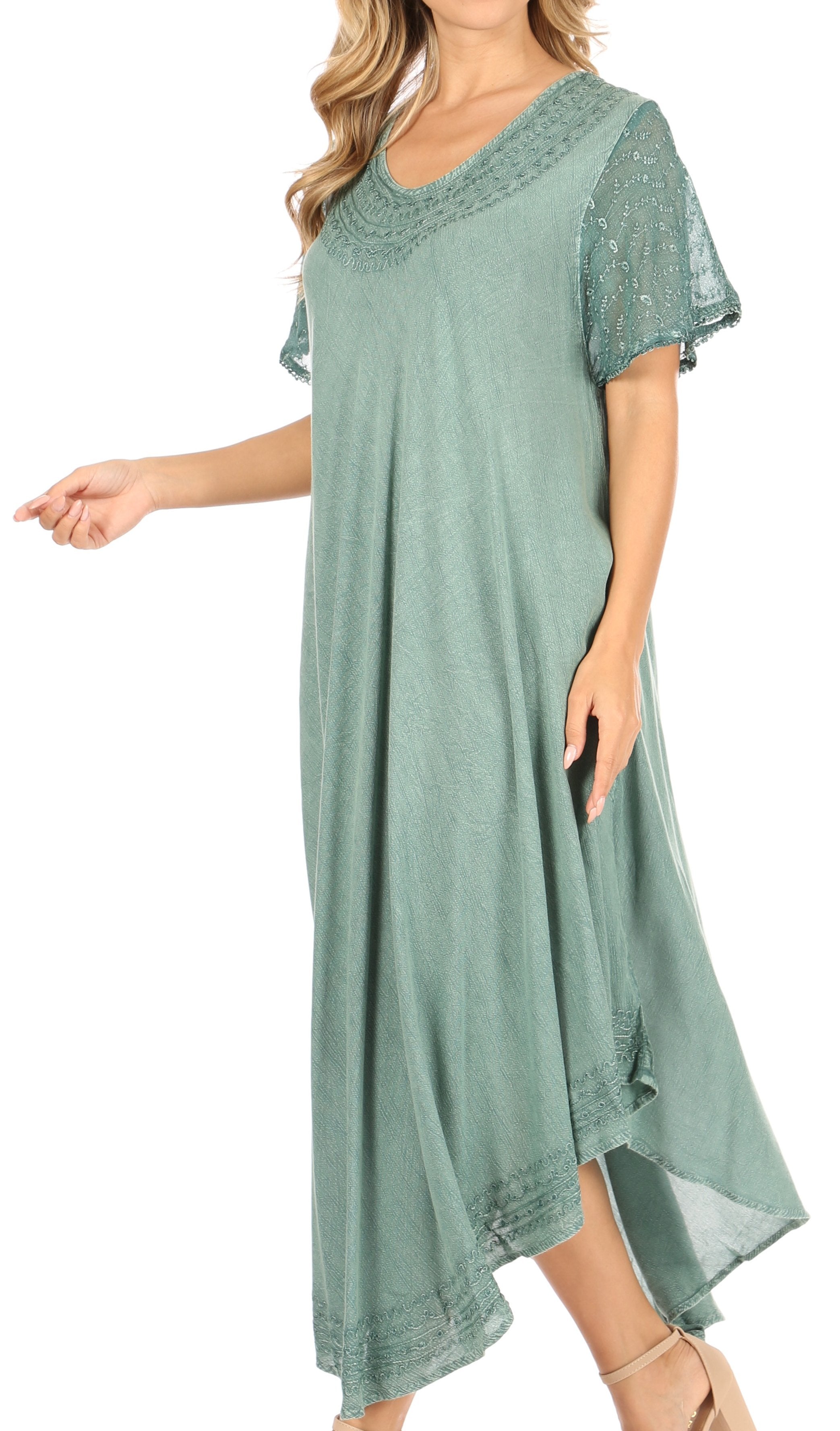 Green dress with lace details on a white background