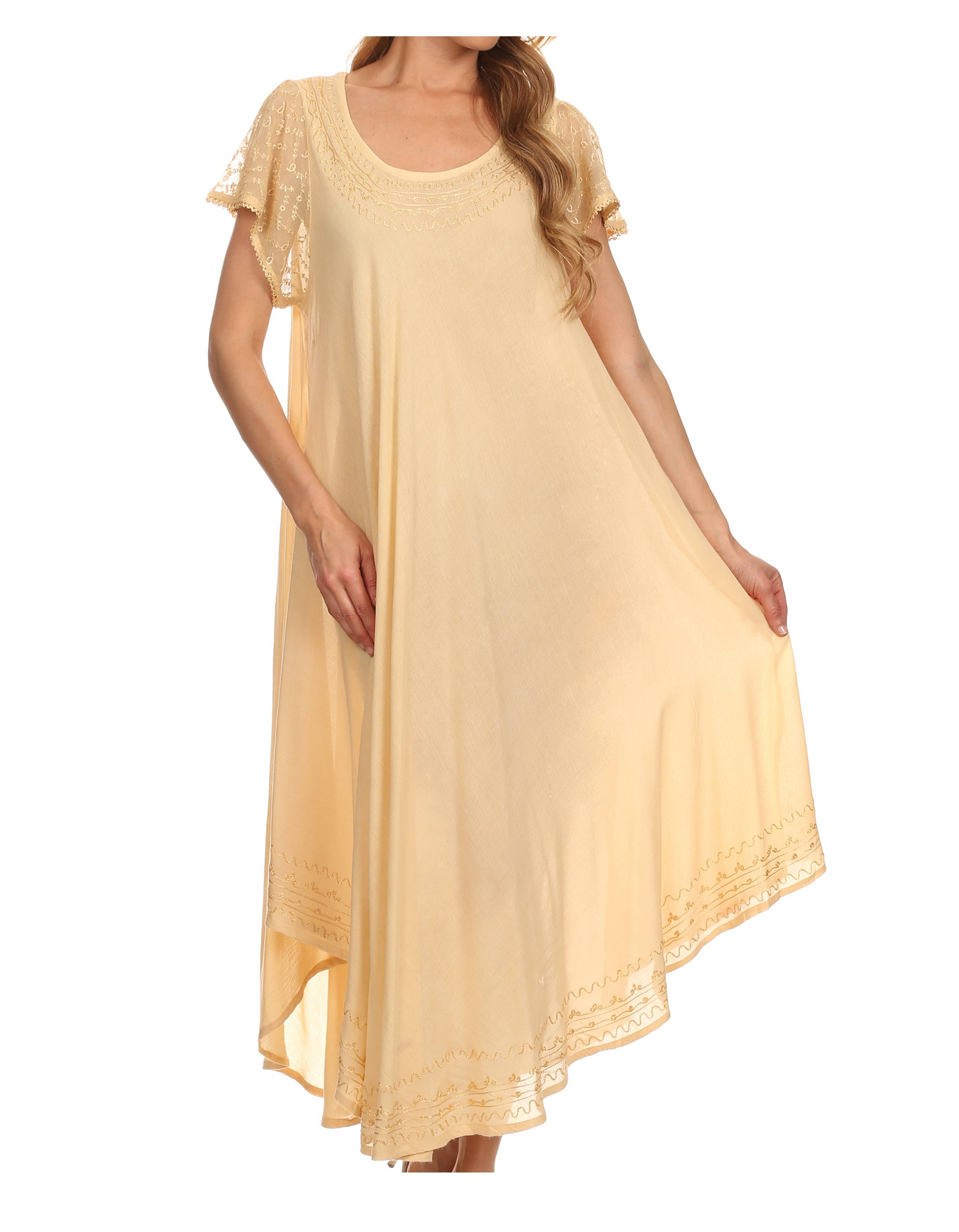 Woman wearing a beige long dress with lace sleeves on a white background