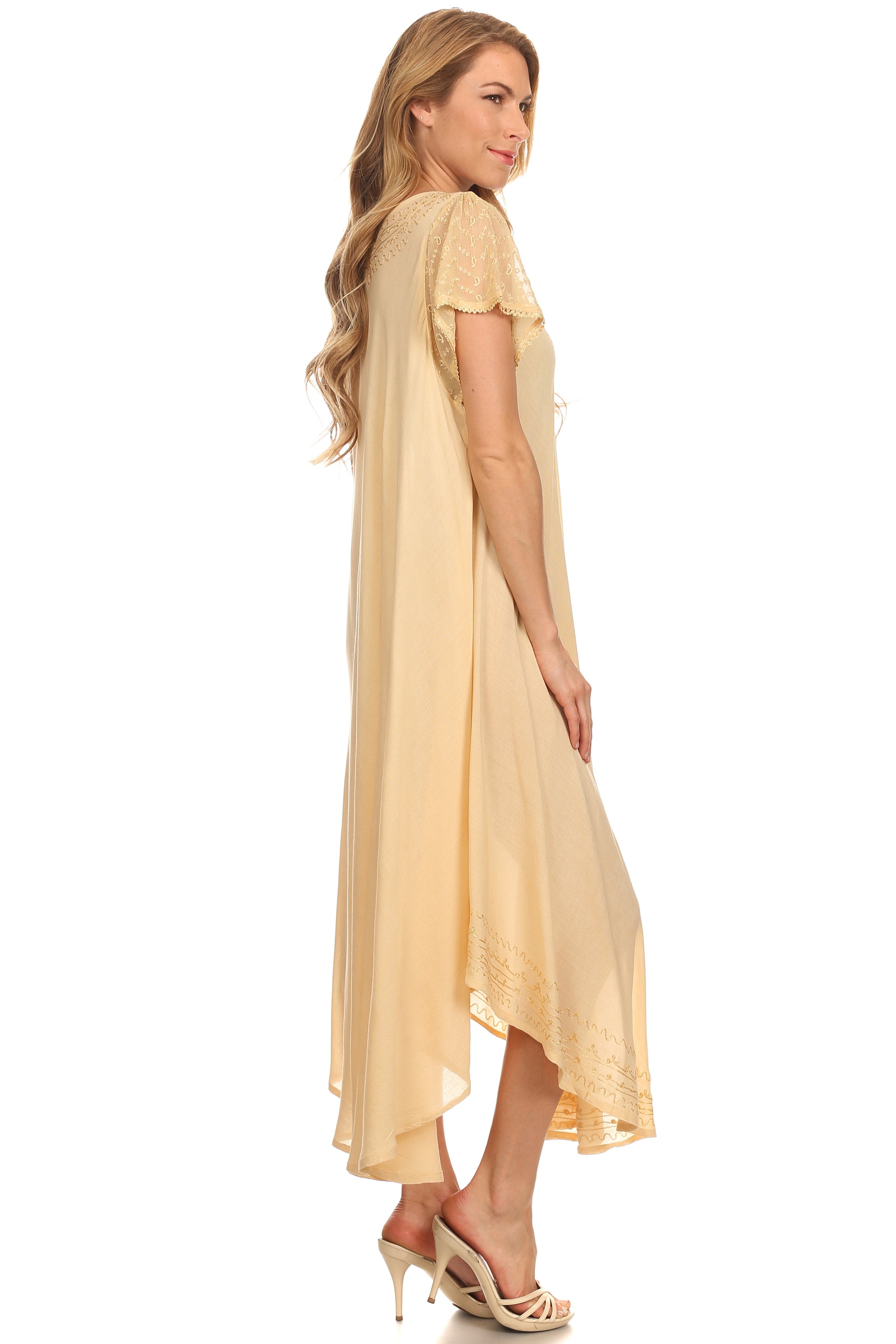 Woman wearing a long, light yellow dress on a white background