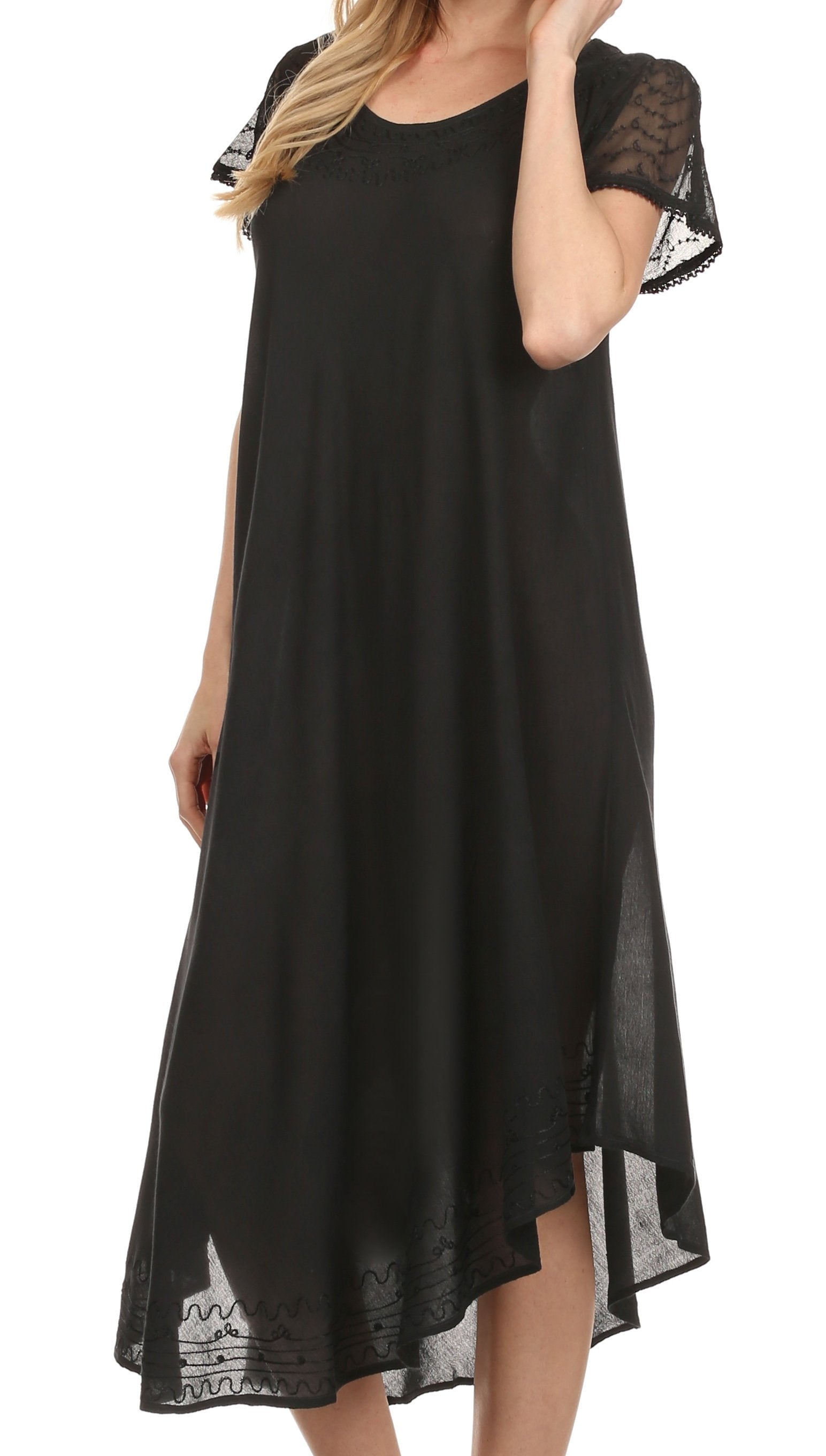 Black dress with lace sleeves and hem on a white background