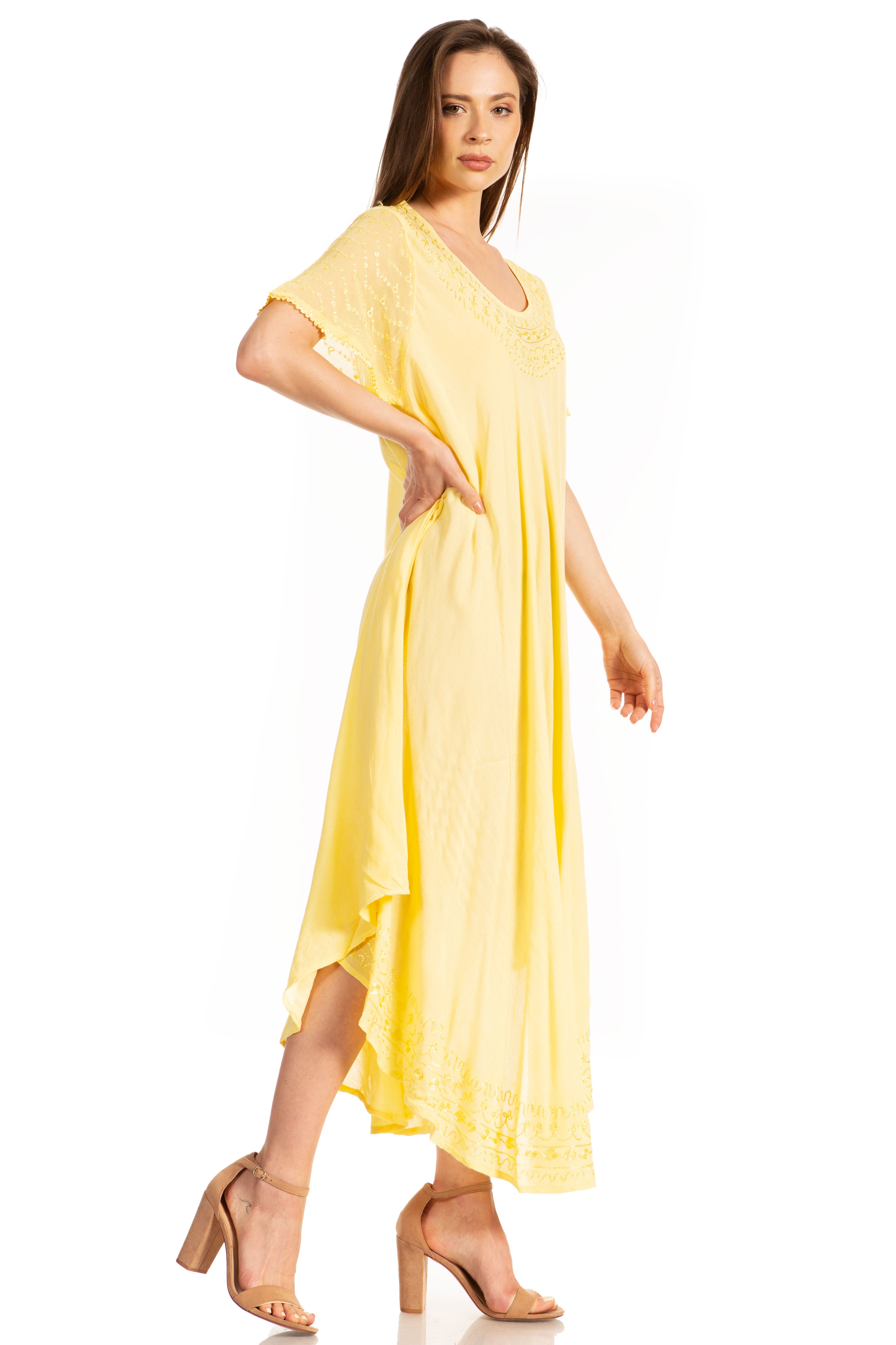 Woman wearing a yellow dress on a white background