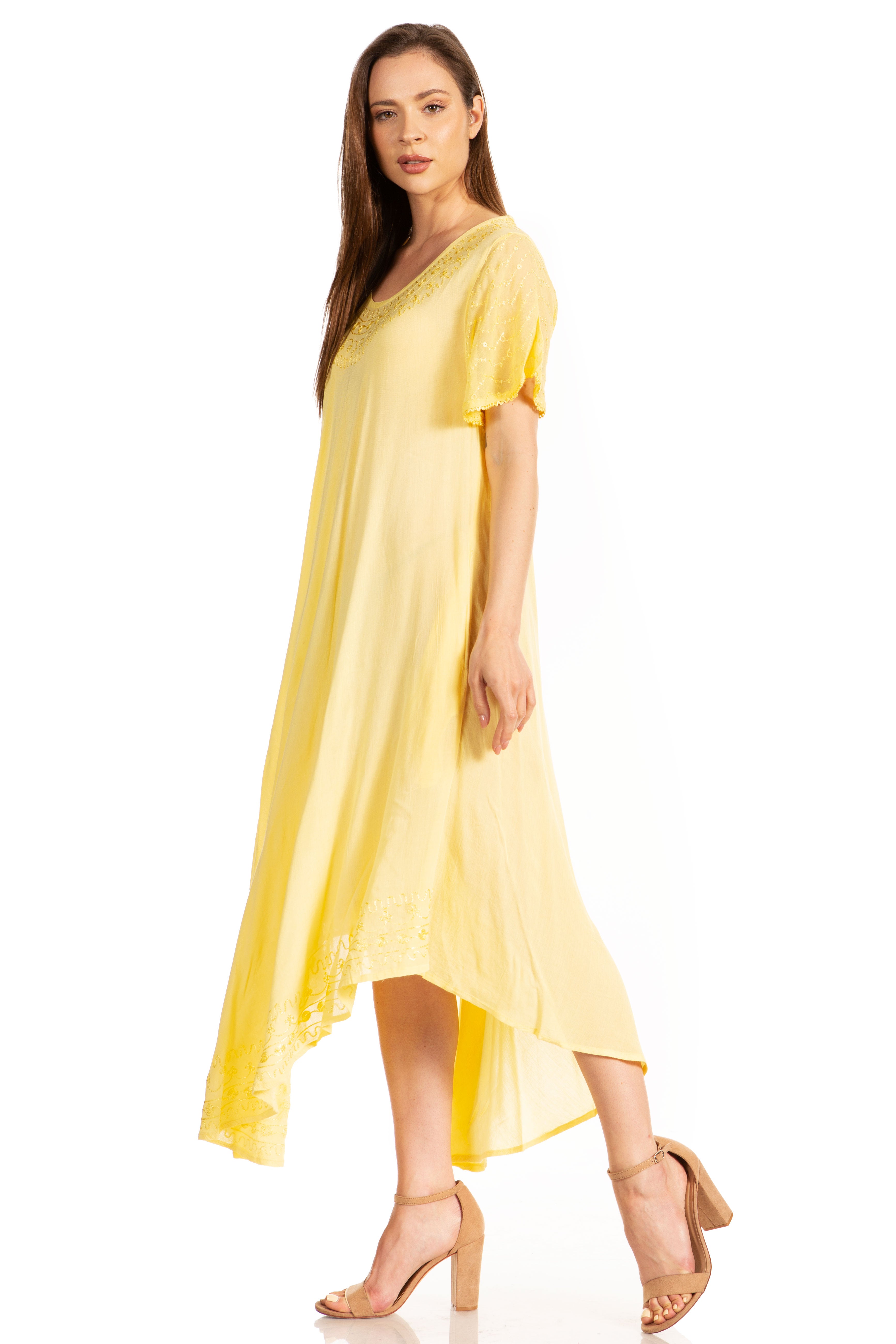 Woman wearing a yellow dress on a white background