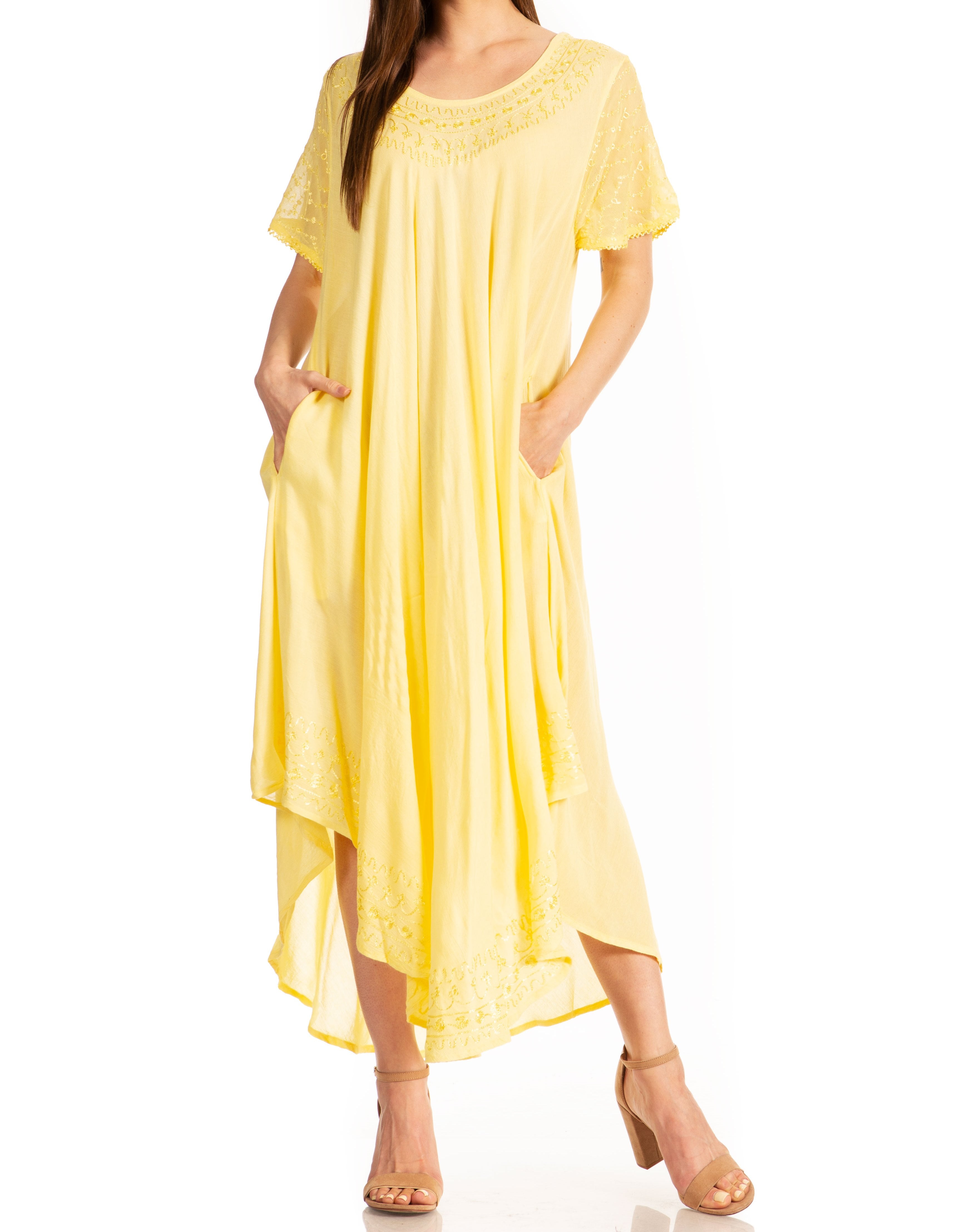 Woman wearing a yellow dress on a white background