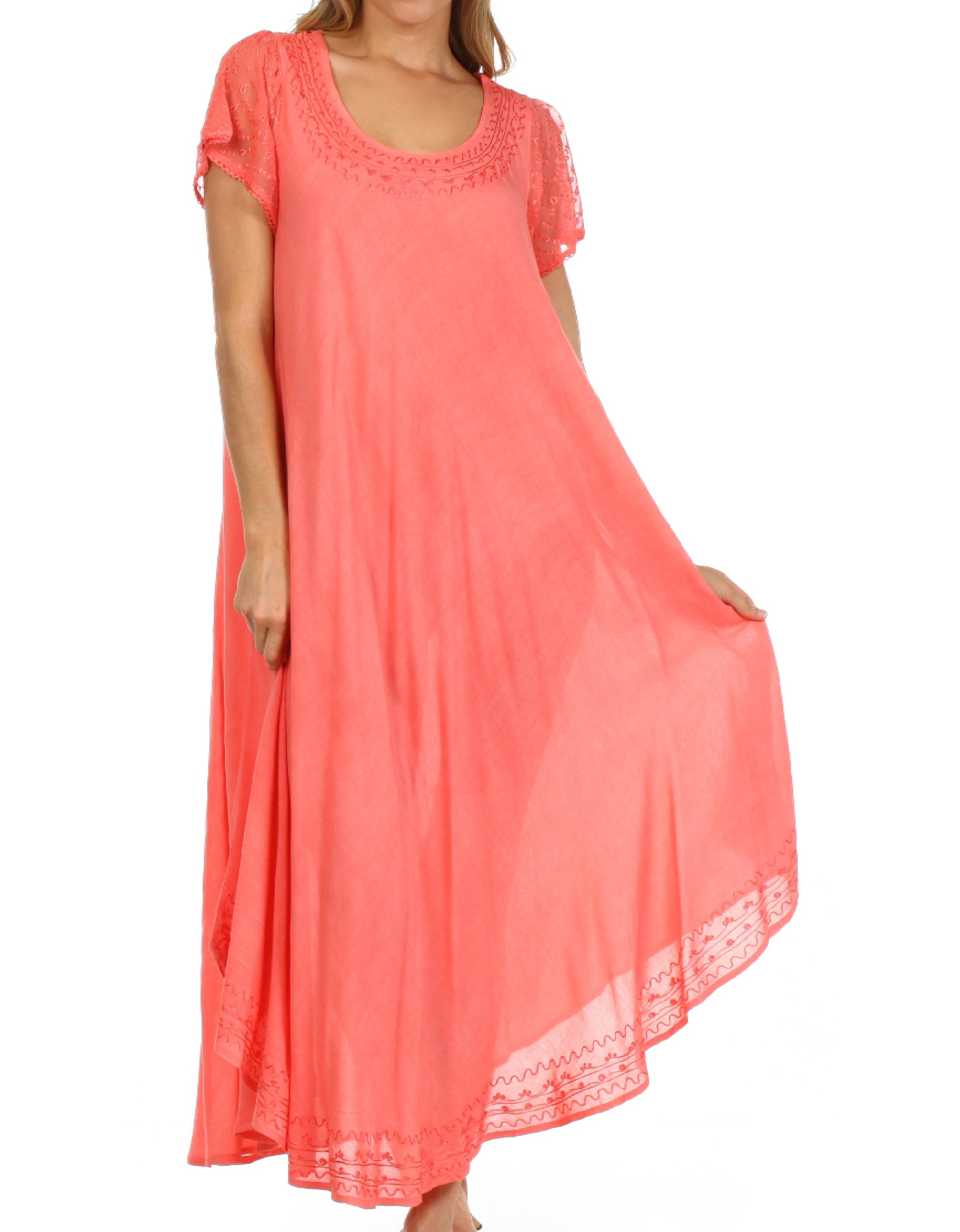 Coral dress with lace details on a white background