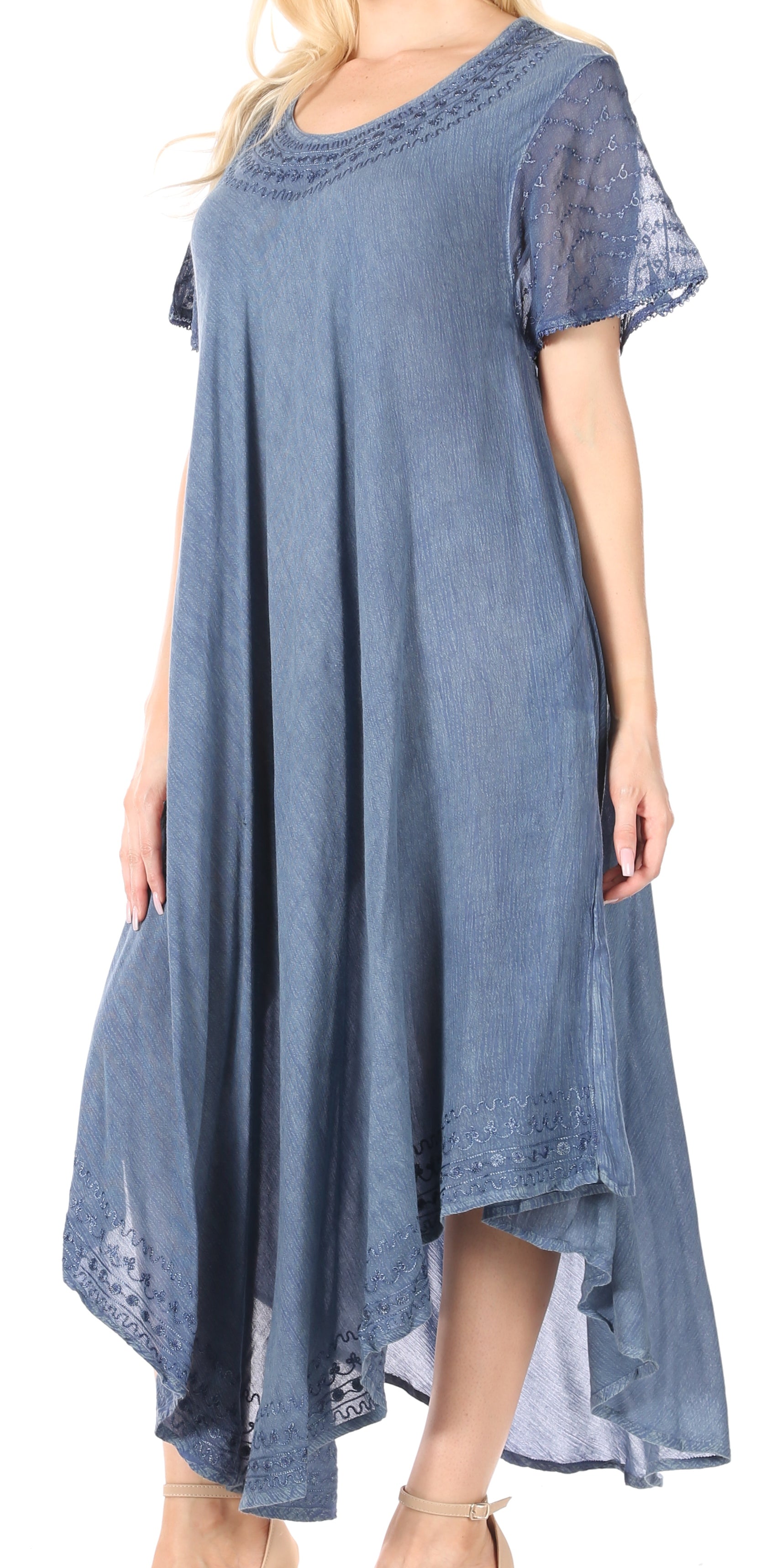 Blue denim dress with lace details on a white background