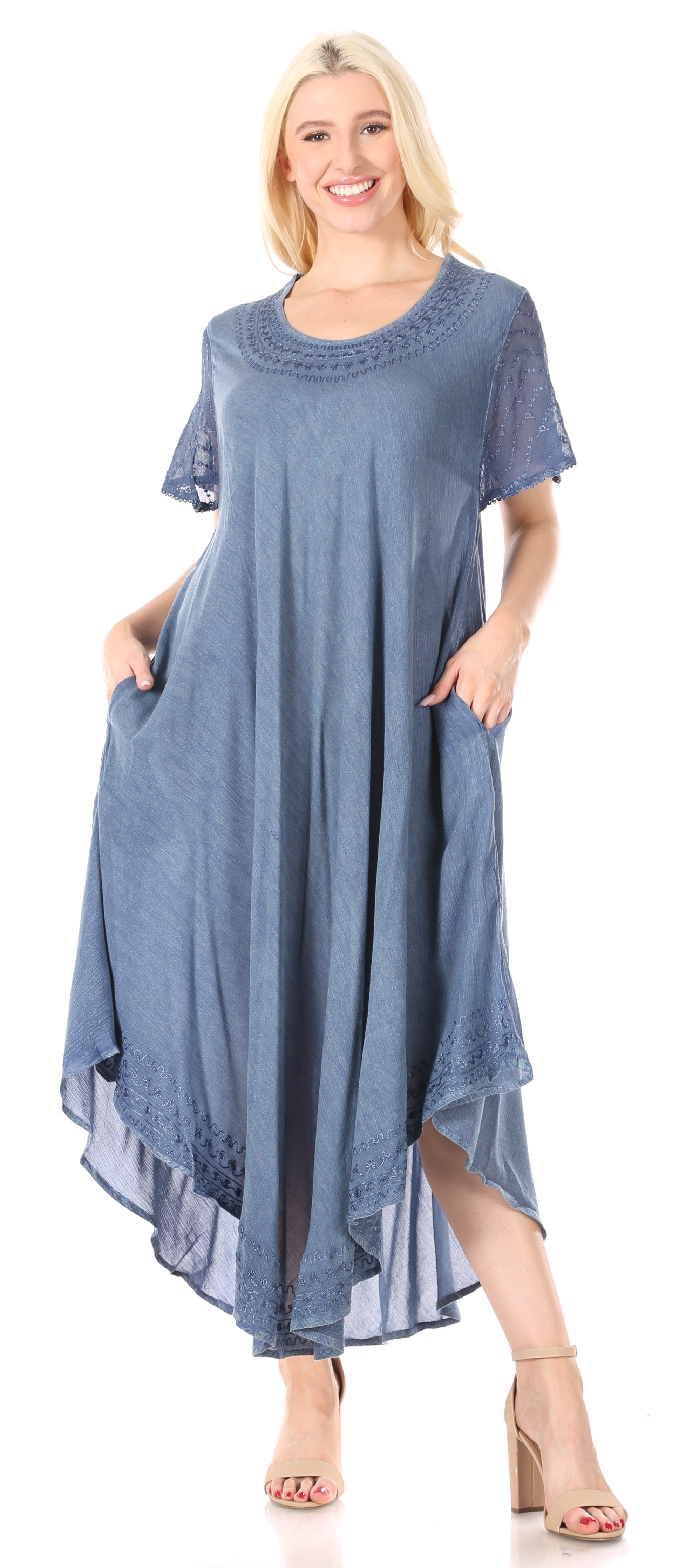Woman wearing a blue dress with a white background