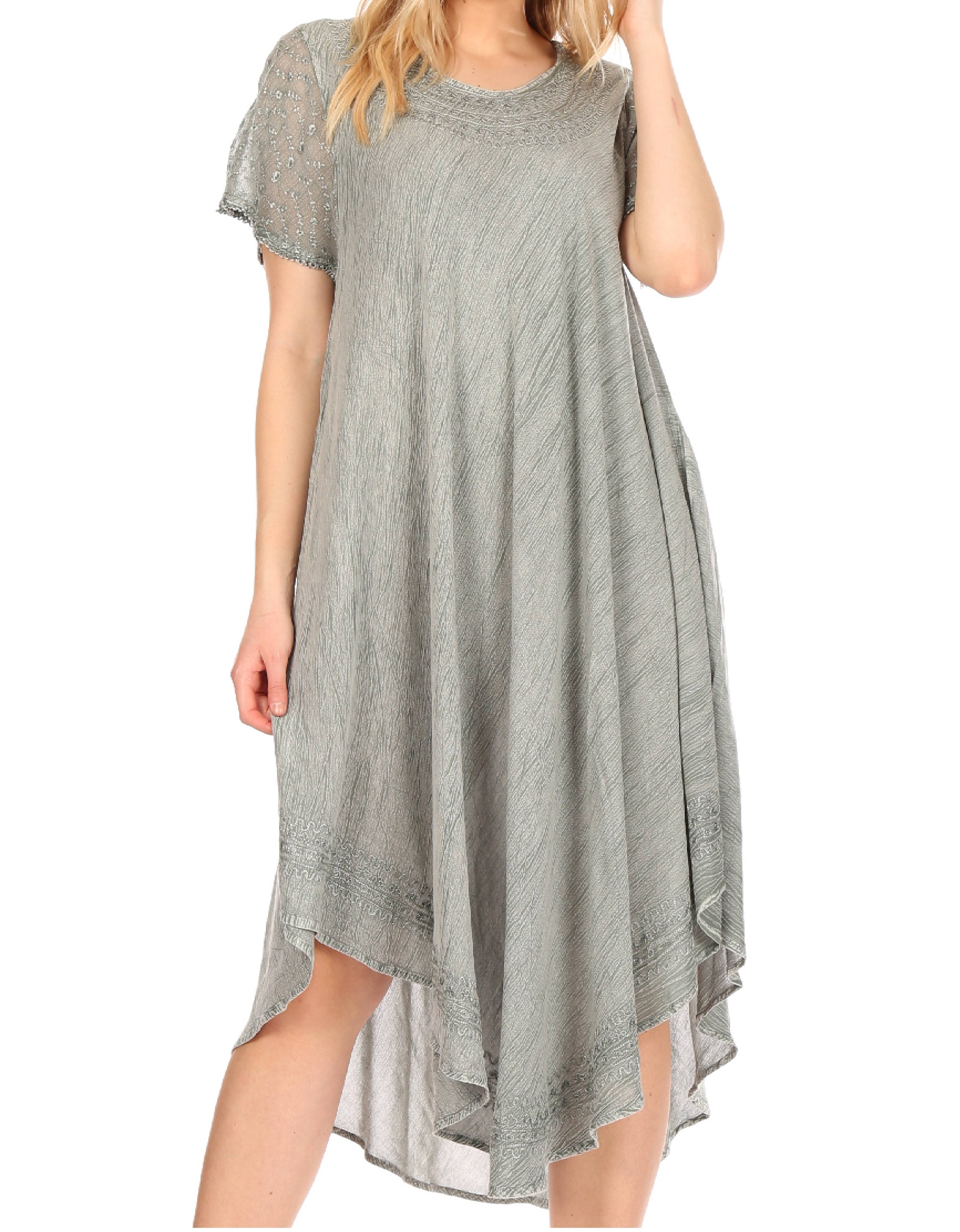 Woman wearing a gray dress on a white background