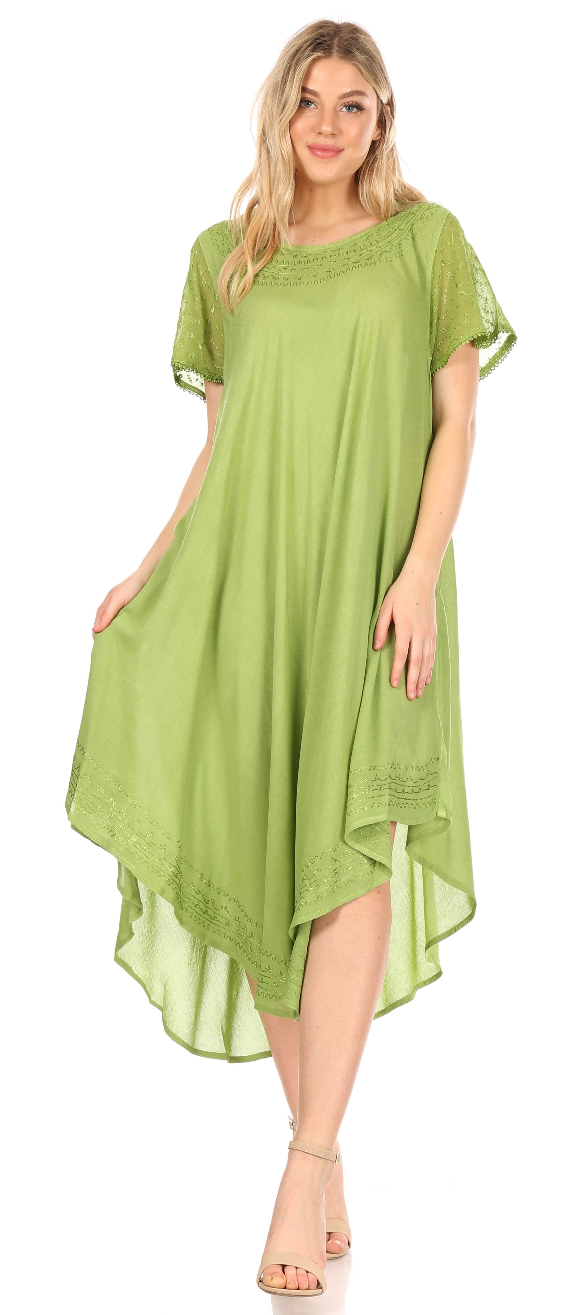 Woman wearing a green dress on a white background