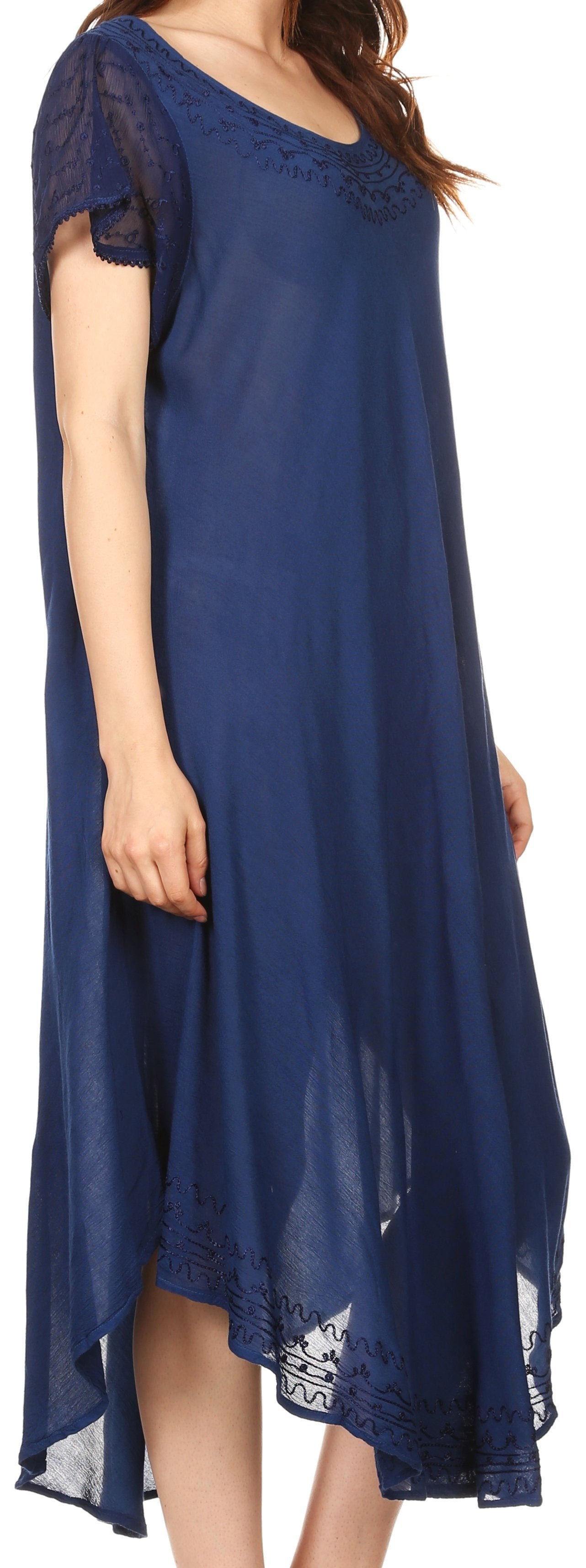 Navy blue dress with lace details on a model