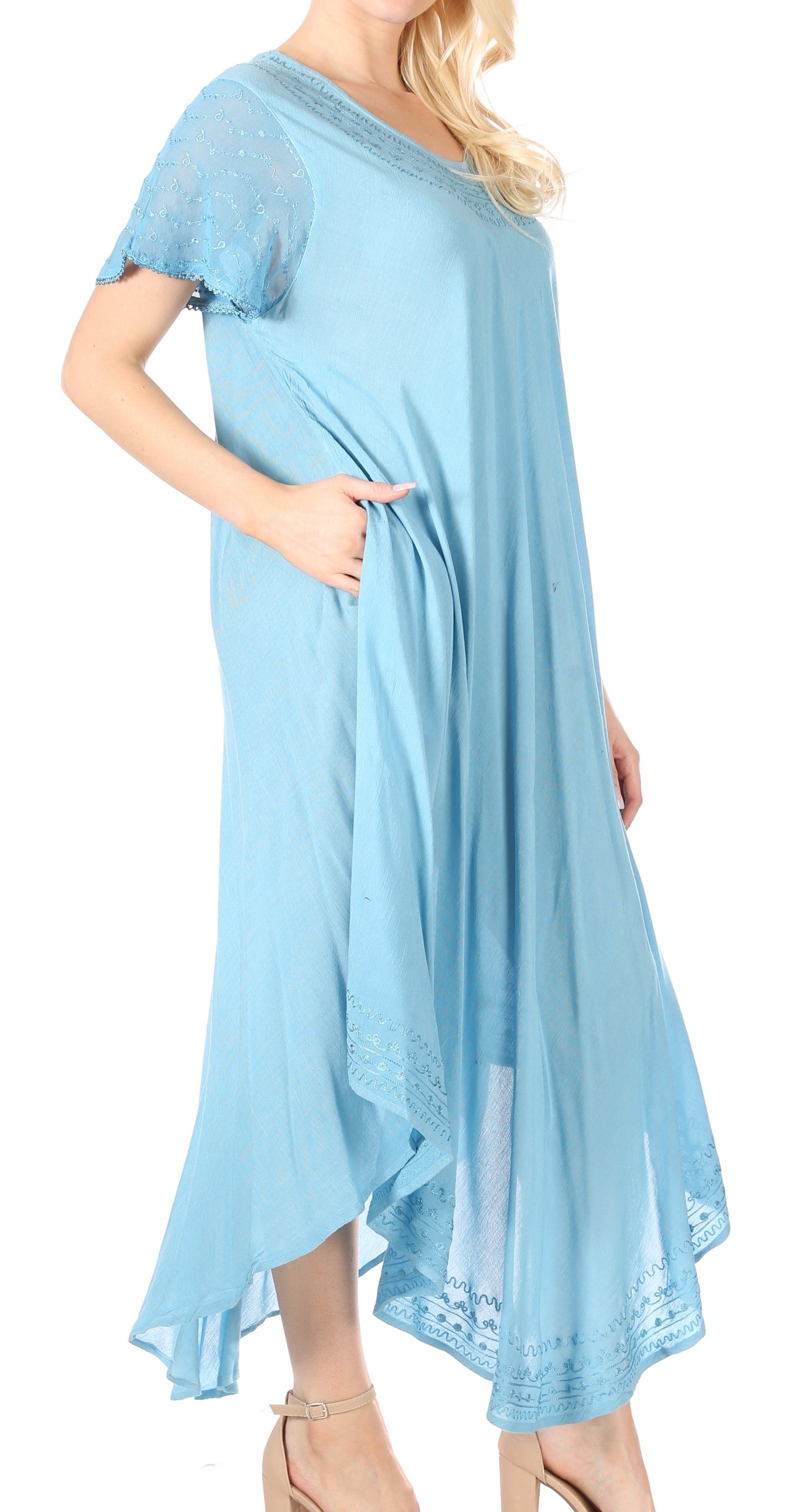 Light blue dress with lace details on a white background