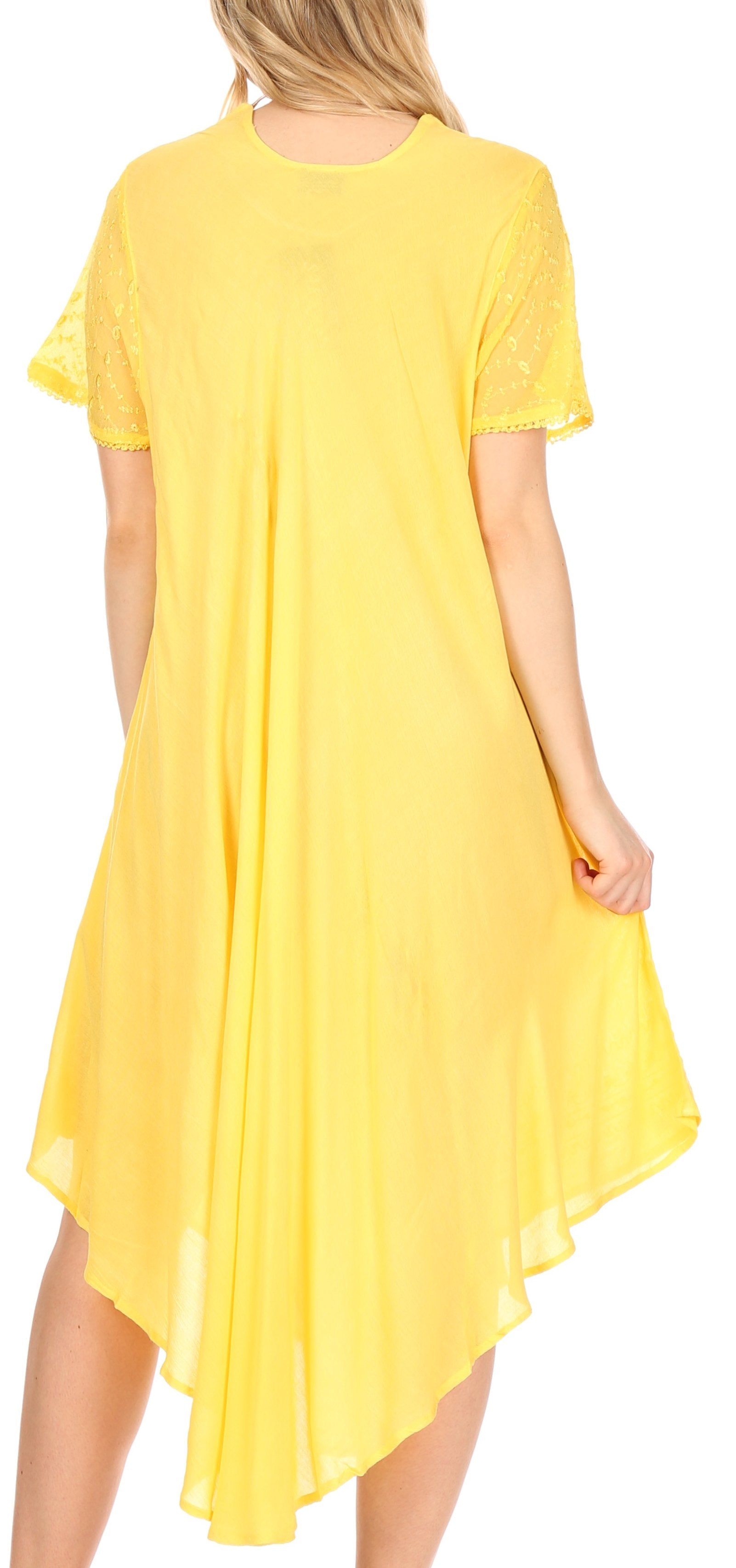 Yellow dress worn by a person on a white background
